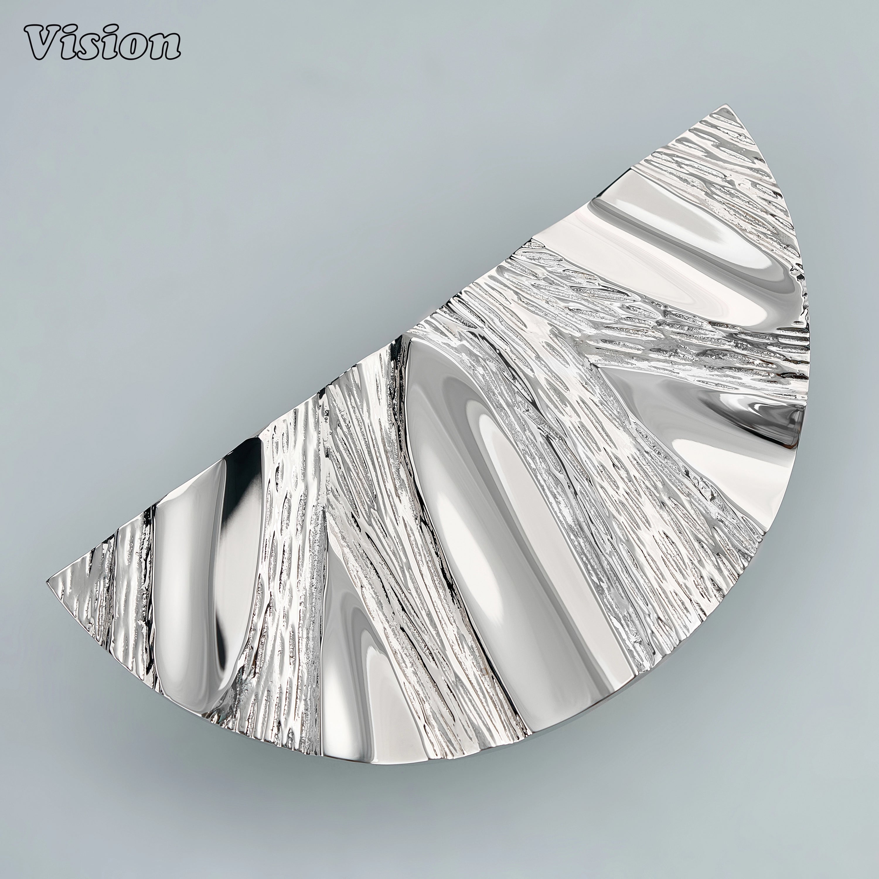 Polished Nickel sculptural brass door handle with handcrafted organic detailing.