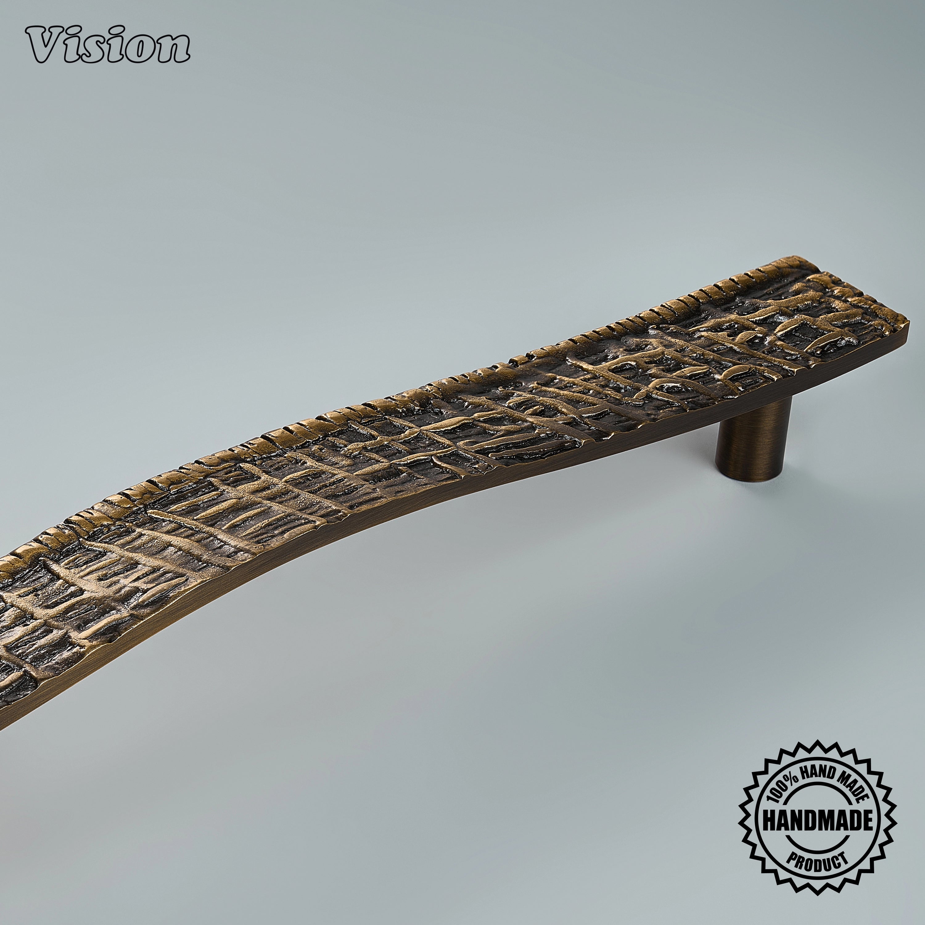 Luxury antique bronze sculpted appliance pull with round base legs on custom built-in freezers