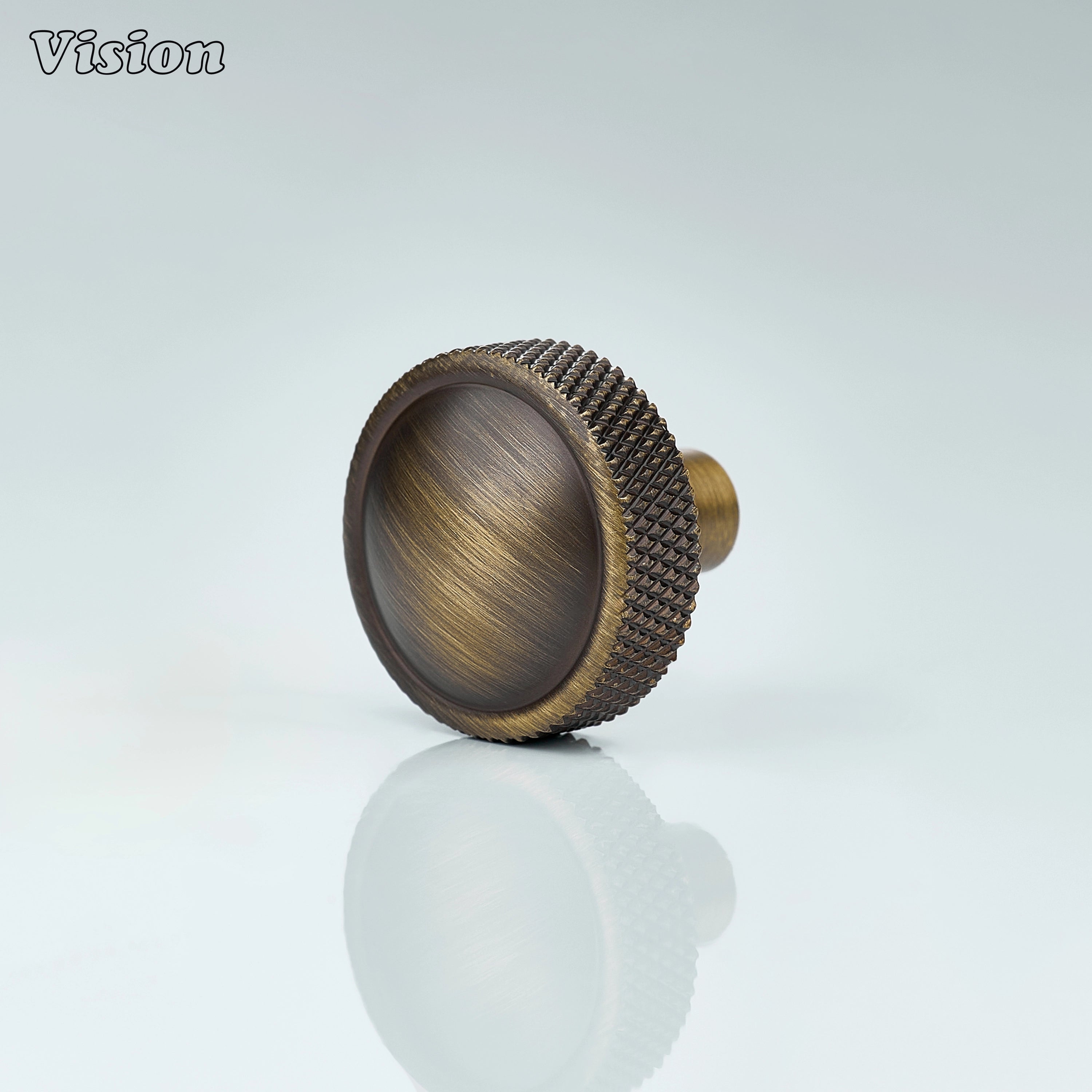 Antique Bronze round cabinet knob with knurled profile and smooth top for classic kitchen cabinets
