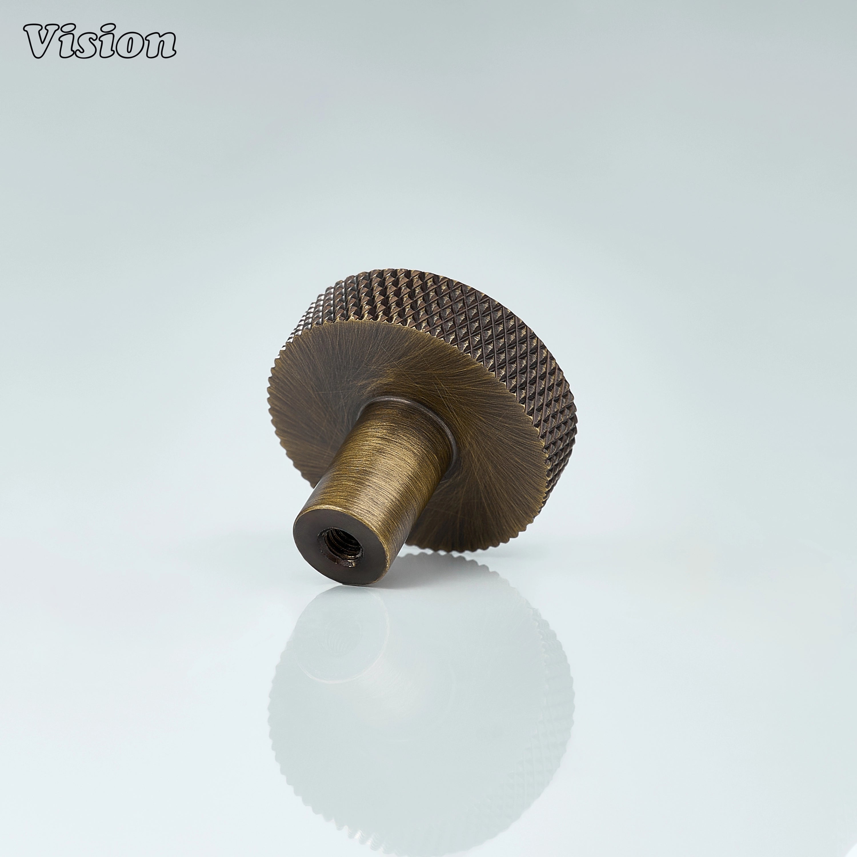 Antique Bronze round cabinet knob designed for traditional and modern interiors