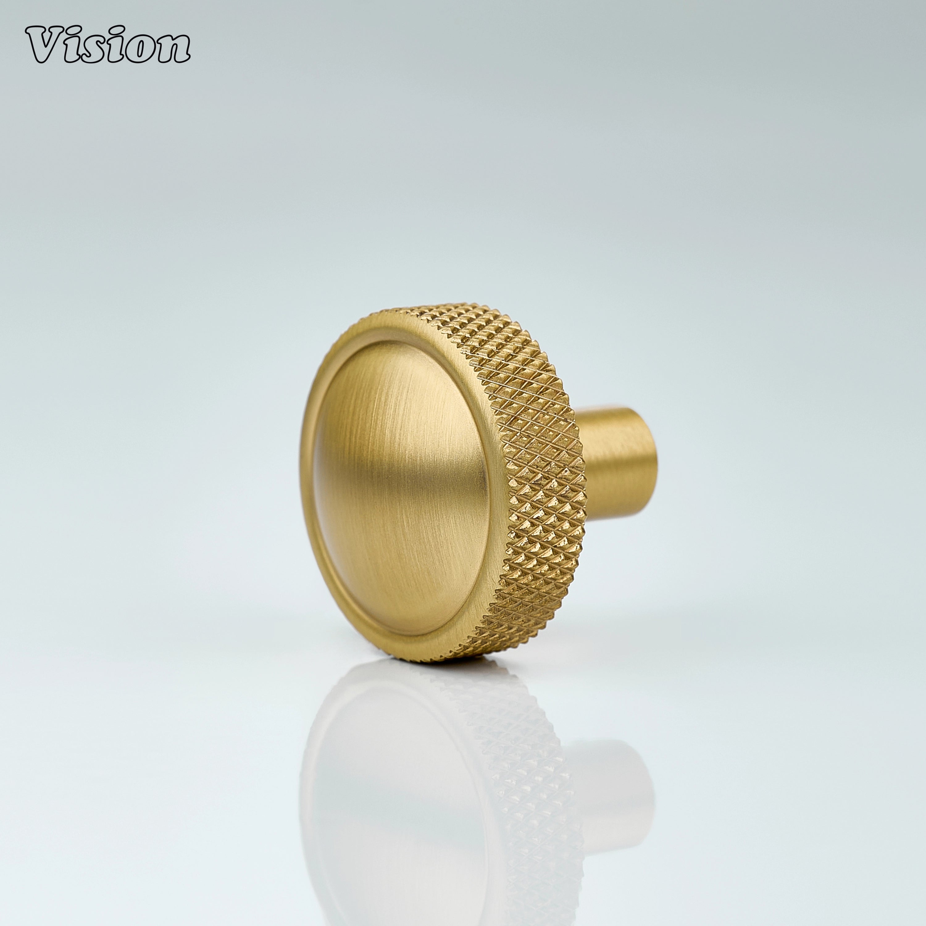 Gold round cabinet knob with knurled profile and smooth top, solid brass design for luxury kitchen cabinets
