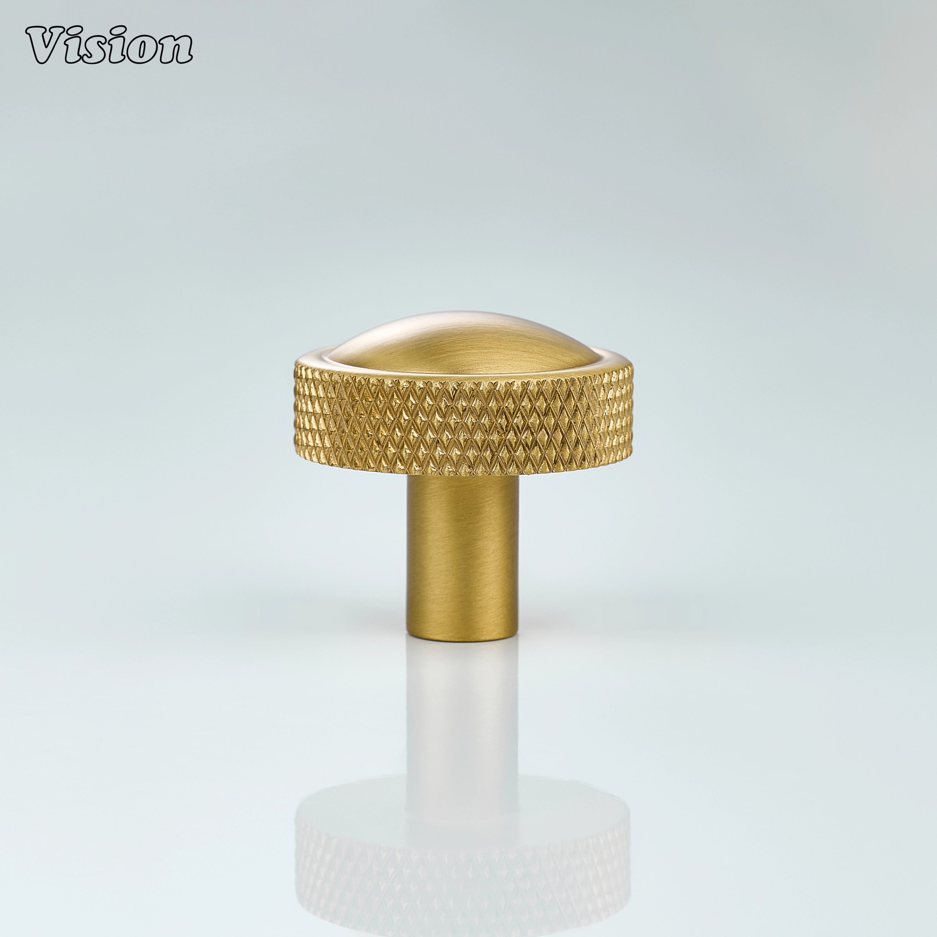 Gold cabinet knob featuring precision knurled edge and smooth round top for drawer fronts