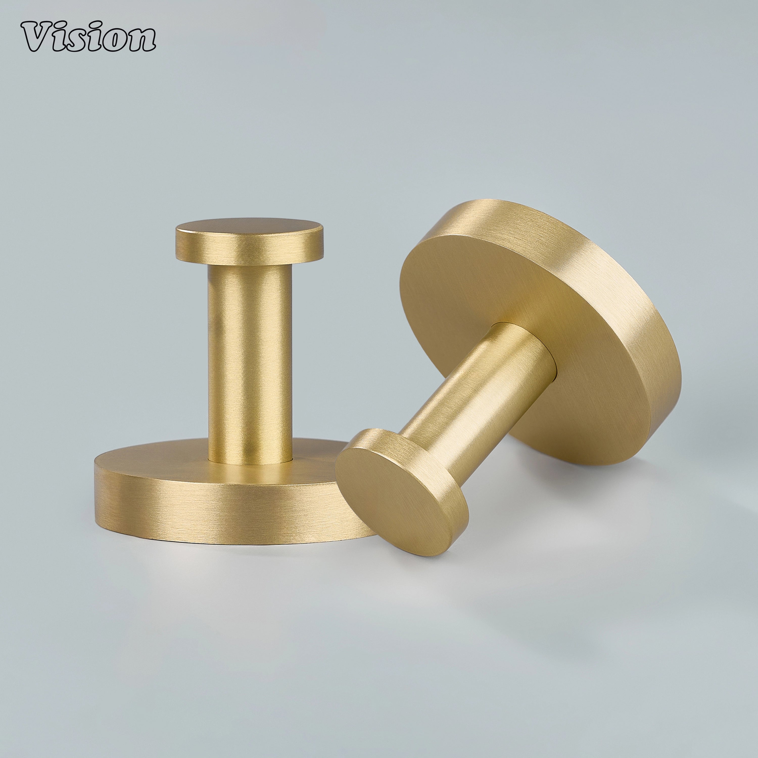 Plain brass wall hook in Gold finish with round base and cylindrical stem for bathroom robe hanging