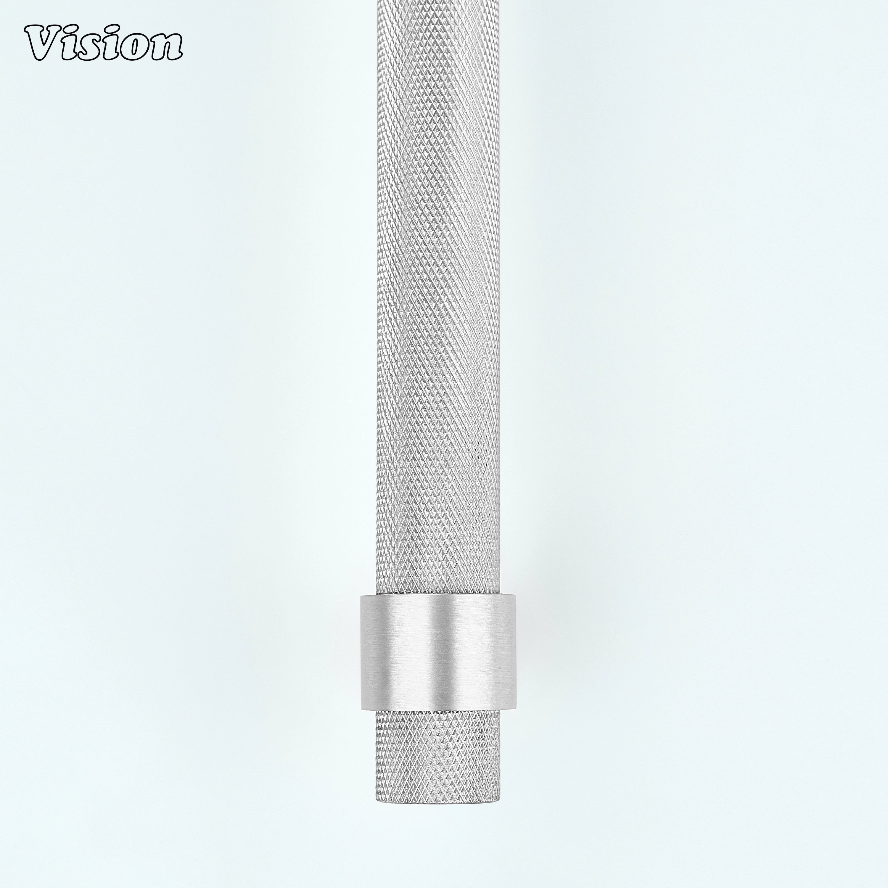 Silver knurled brass appliance handle for custom appliance furniture installations.