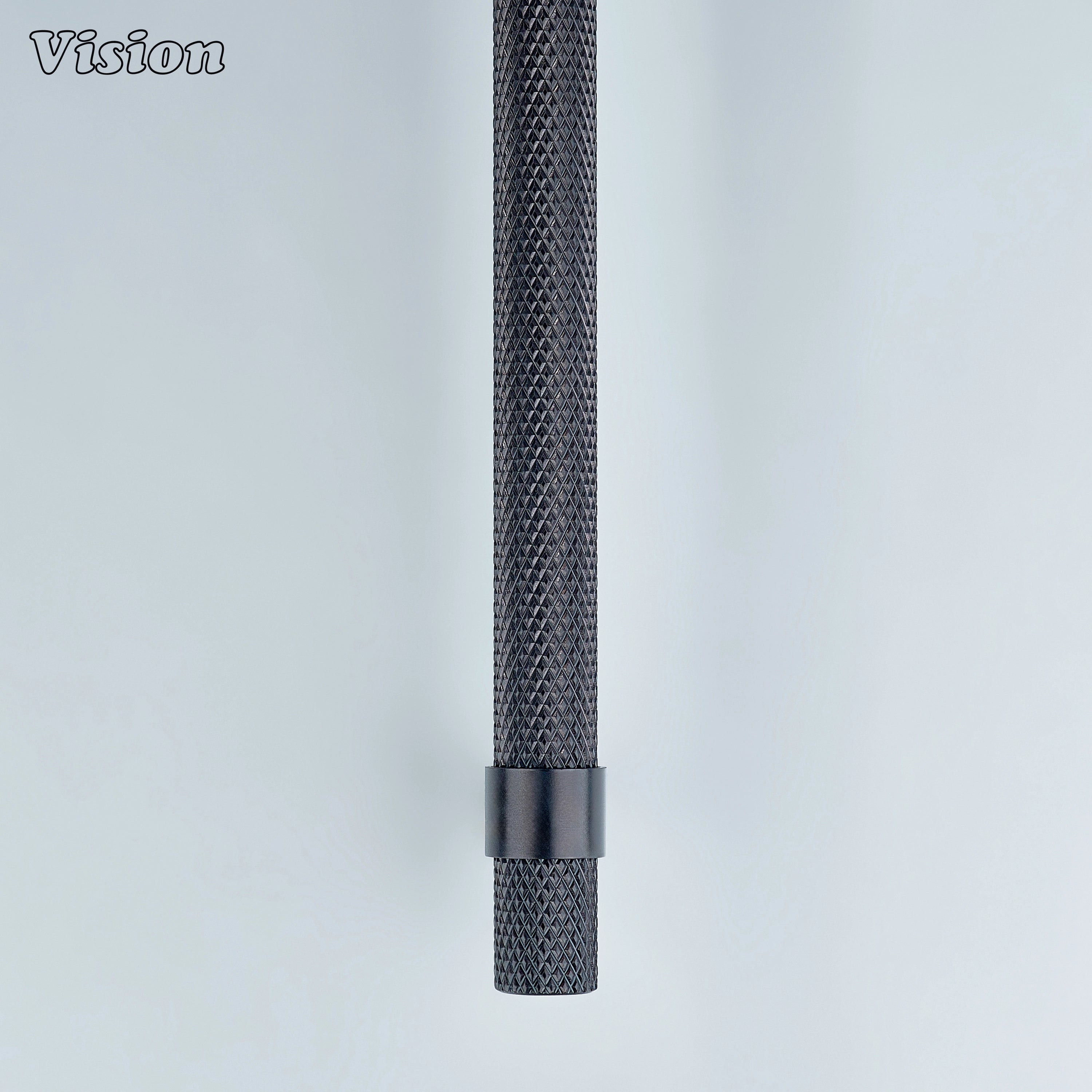 Modern oil rubbed bronze knurled handle with cone legs used for vanity drawers.