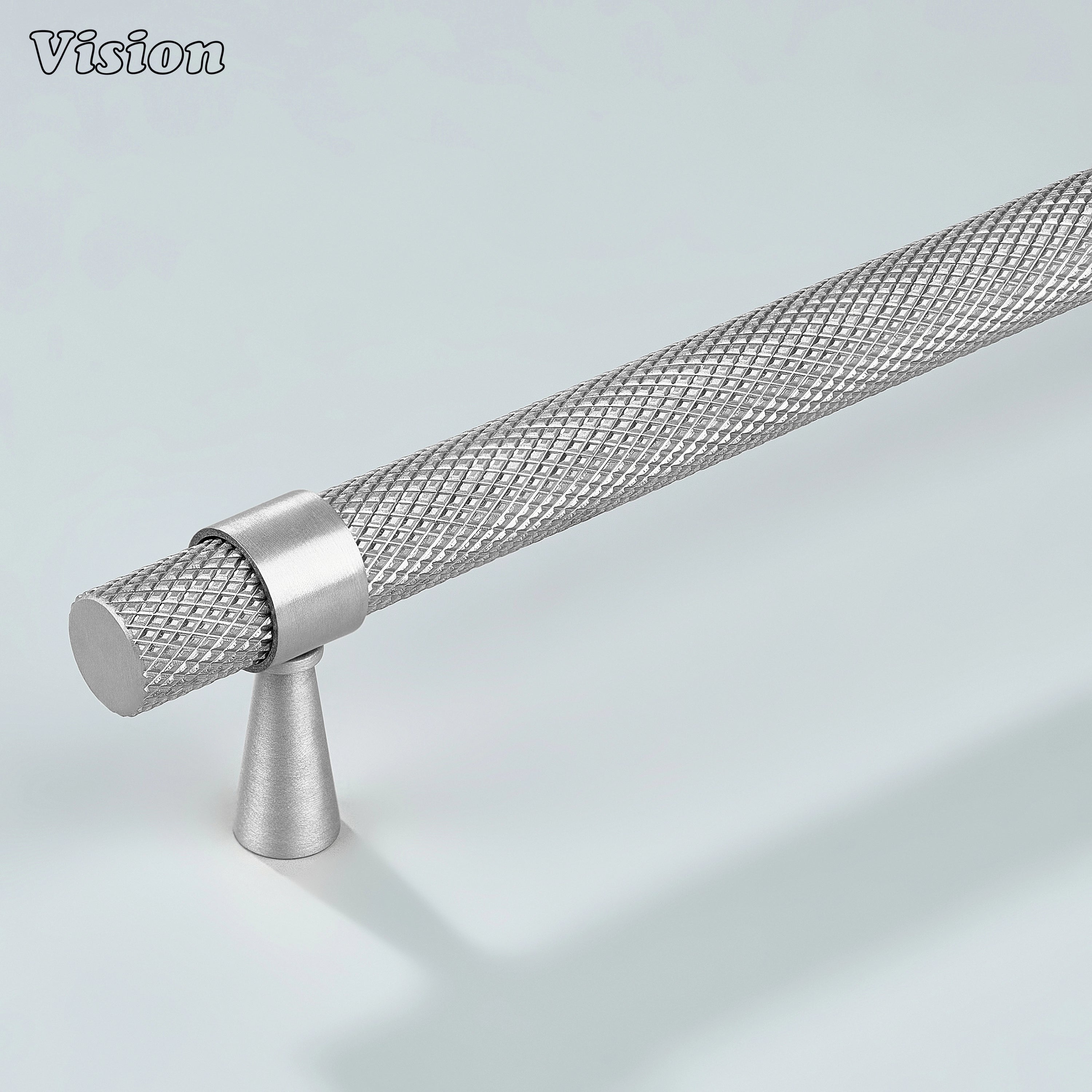 Modern silver brass Canyon knurled handle used for kitchen cabinets.