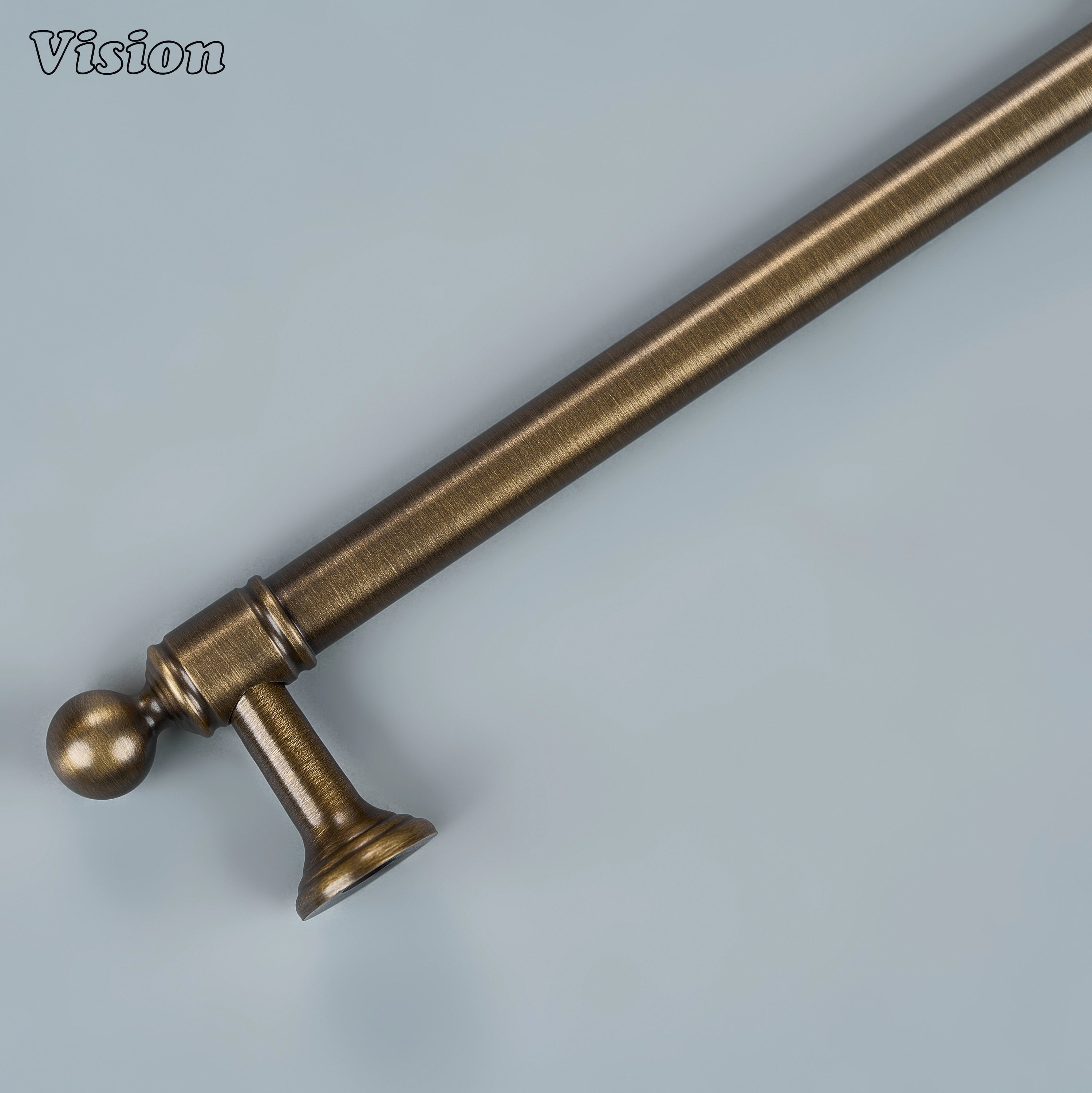 Classic antique bronze tiered cabinet handle on minimalist kitchen drawers