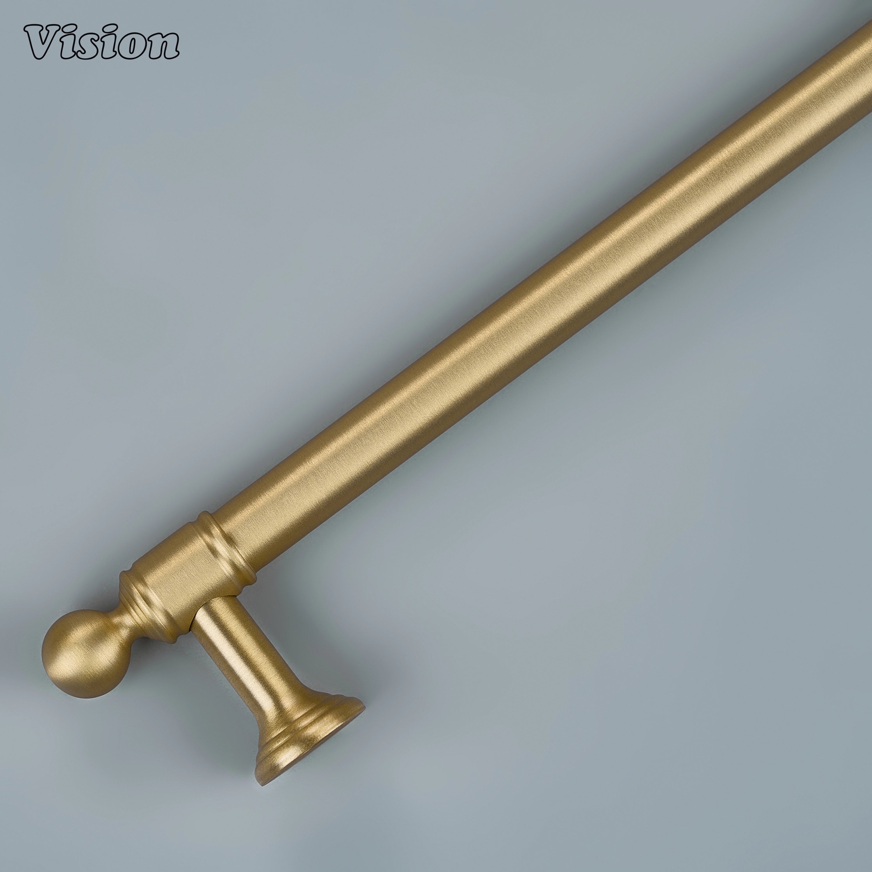 Classic gold tiered cabinet handle on minimalist kitchen drawers