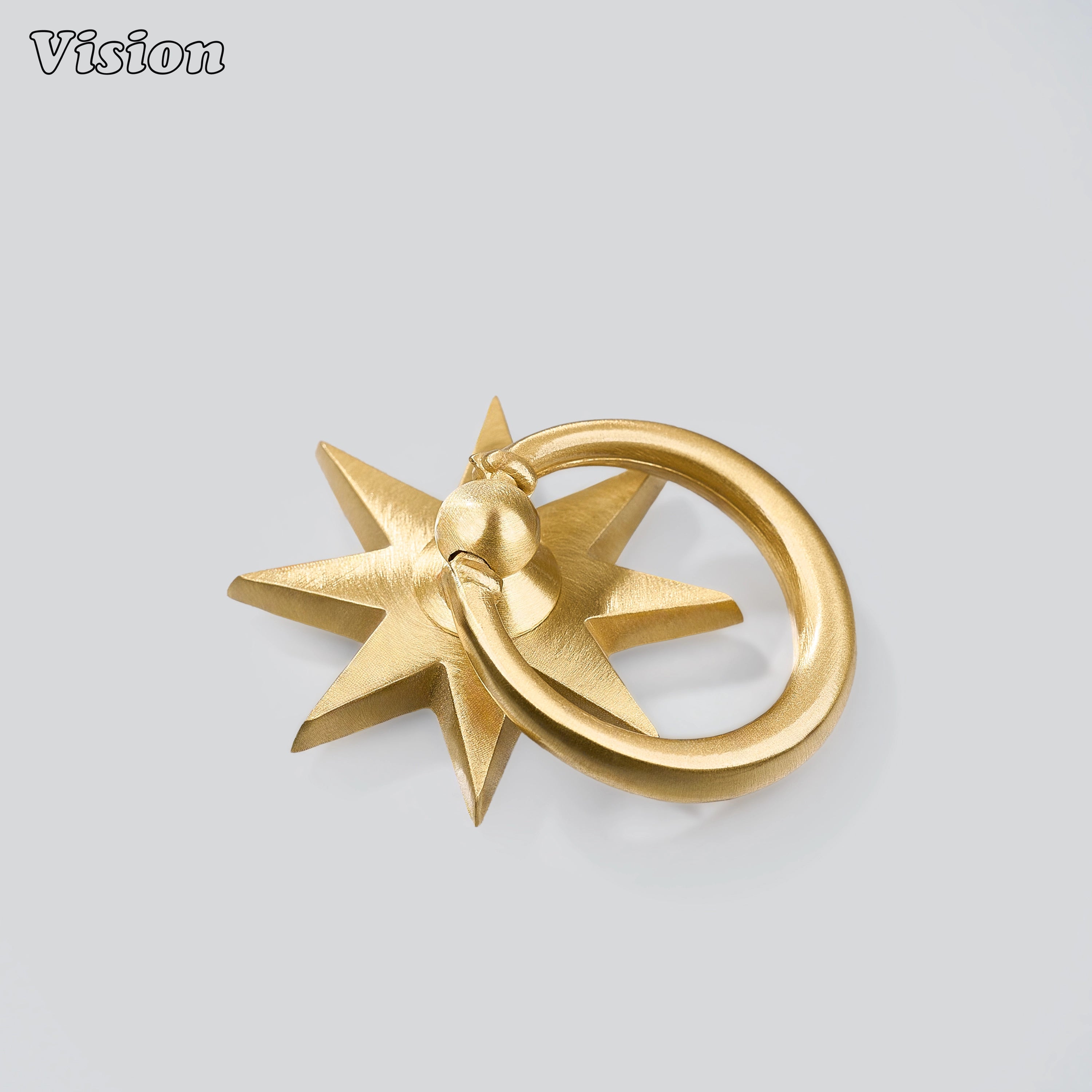 Gold plain cabinet ring pull with smooth profile and starburst plate for luxury wardrobes