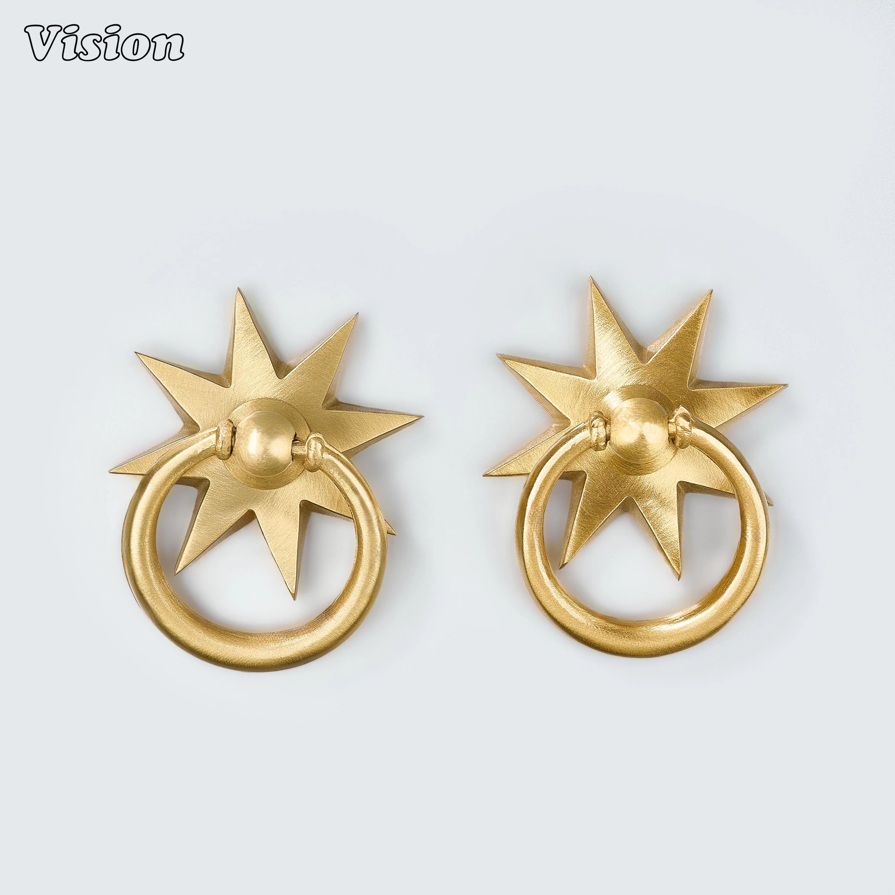 Gold plain medallion drop pull featuring smooth round ring and starburst profile for wardrobe doors and furniture.
