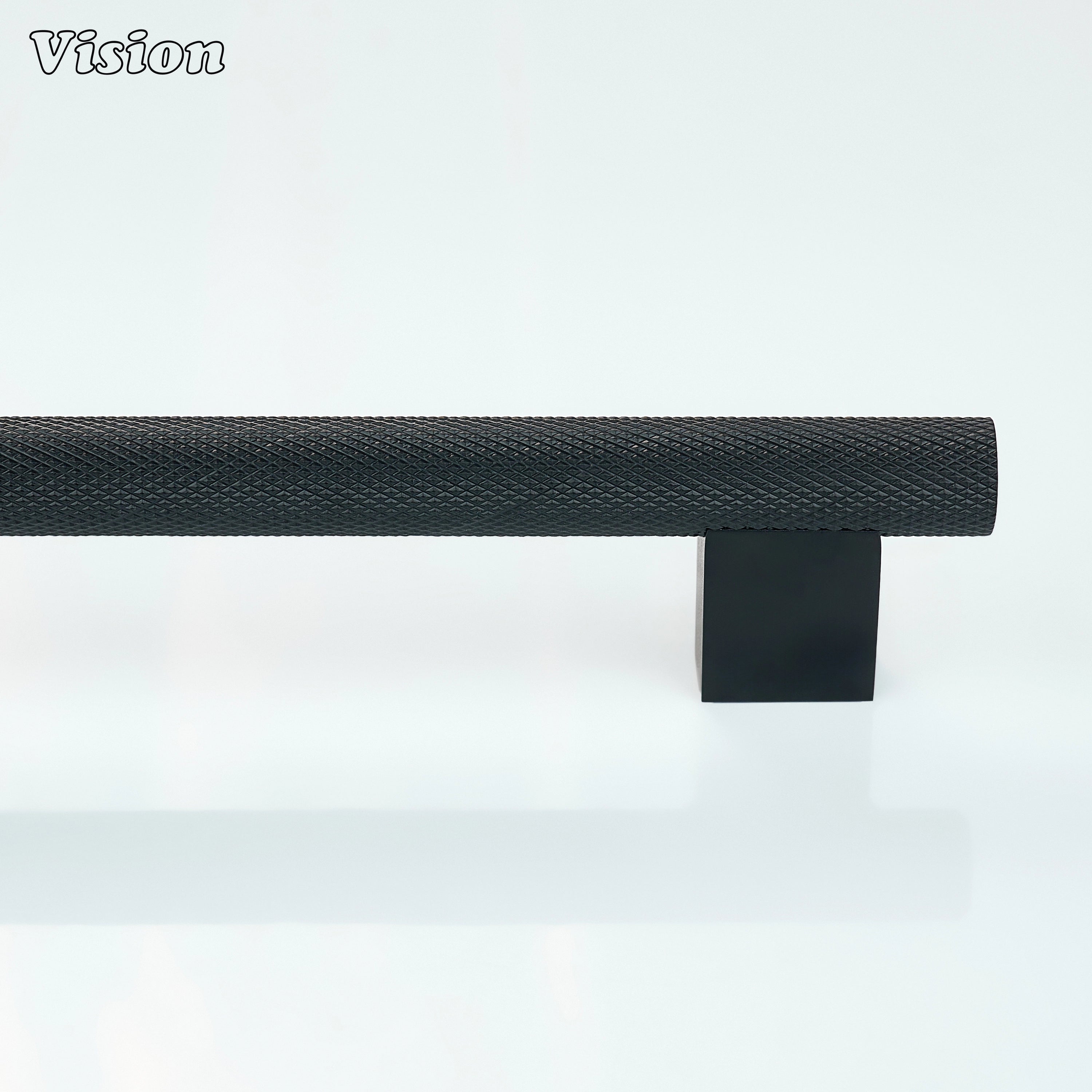 Black knurled brass handle mounted on cabinet doors