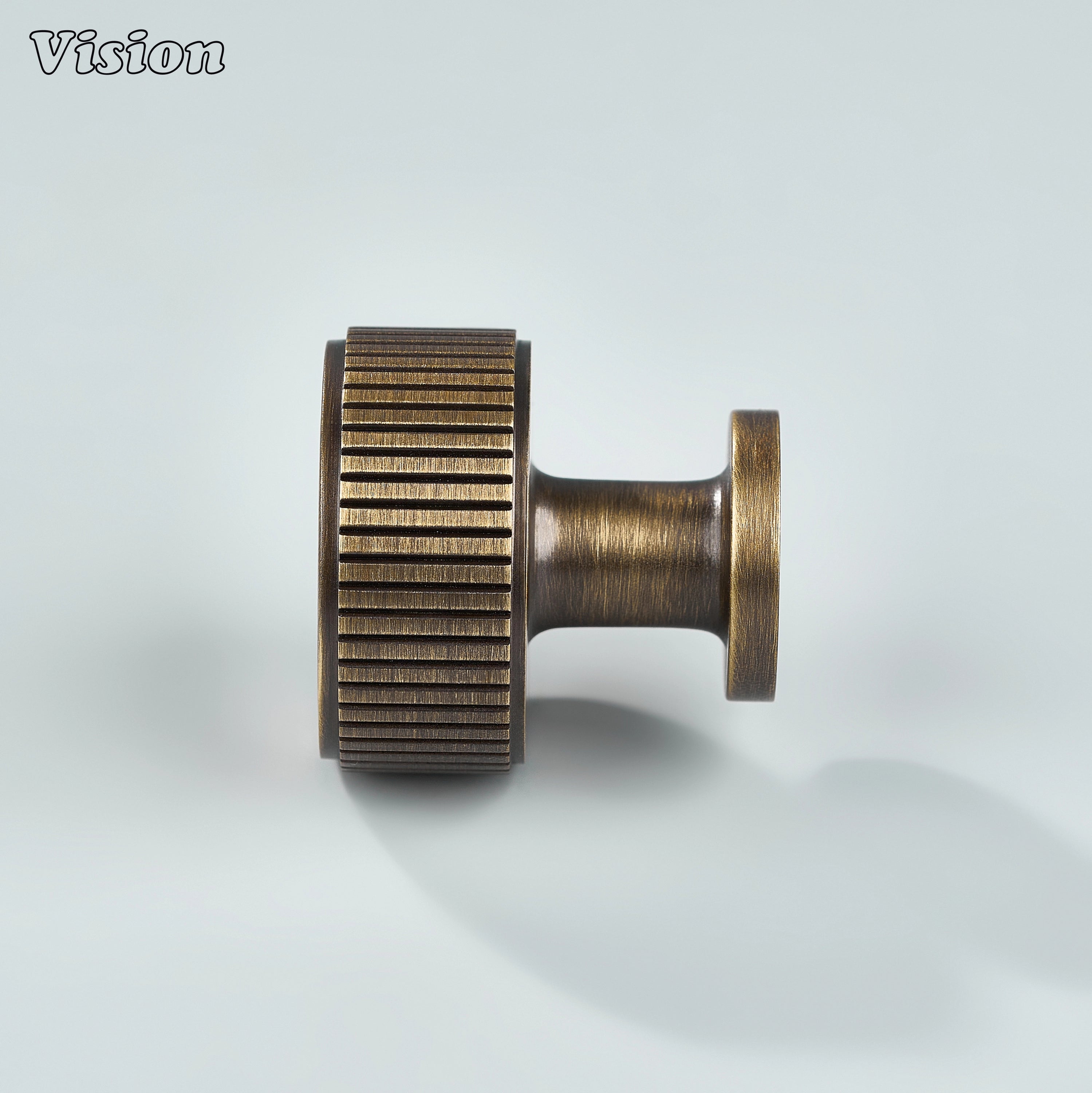 Solid brass round cabinet knob in Antique Bronze with linear knurled detailing for drawers
