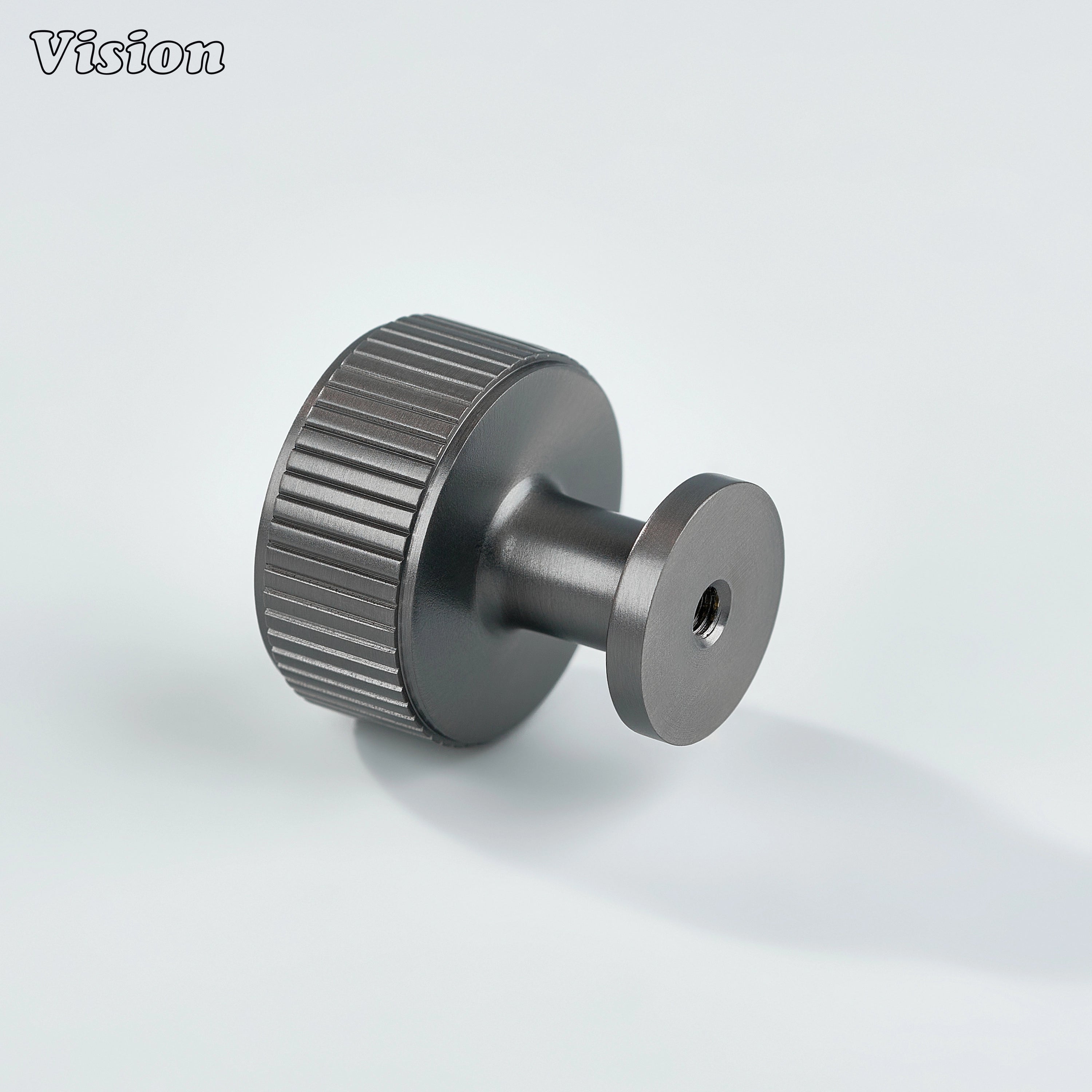 Gunmetal knurled brass round cabinet knob with clean circular design for wardrobes