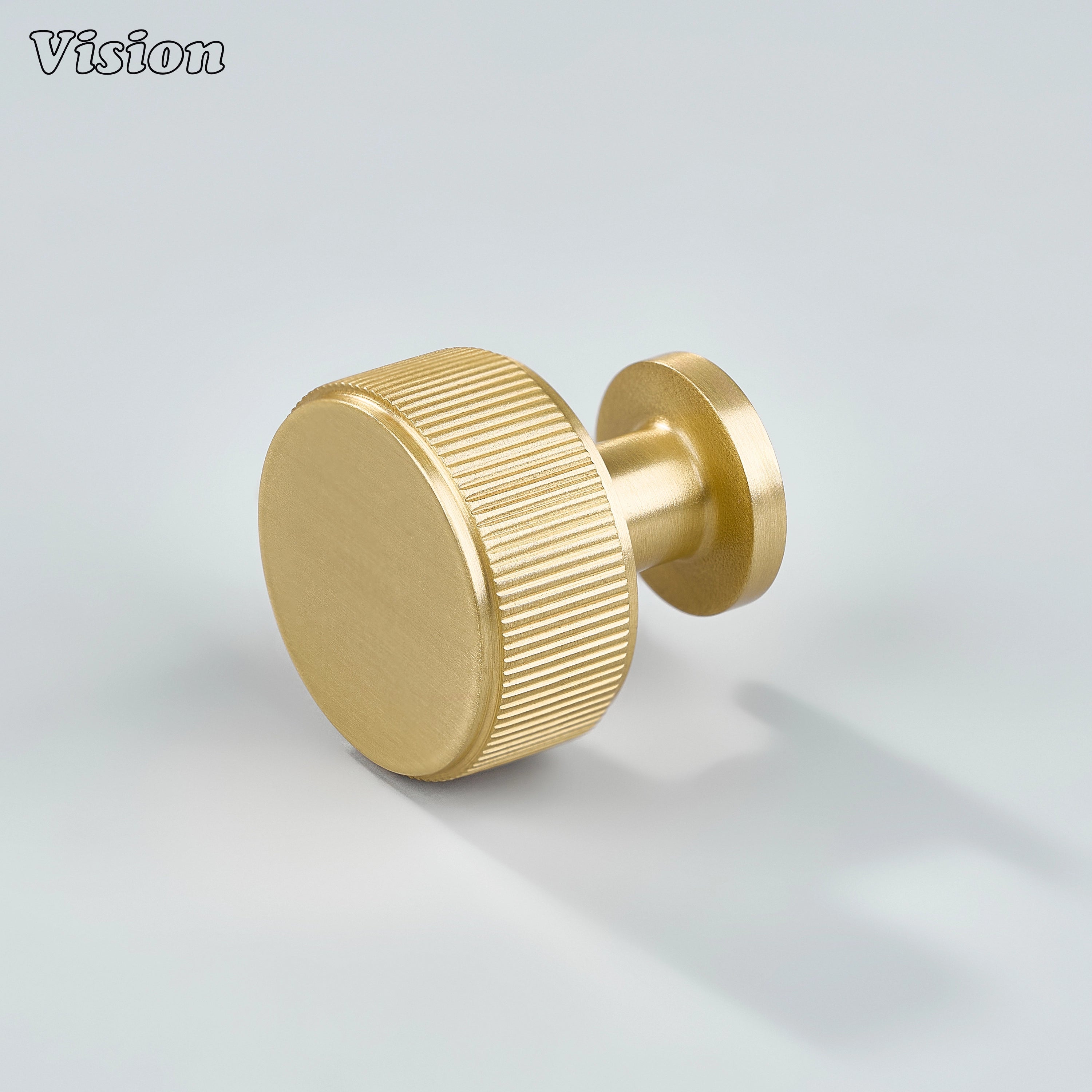 Gold linear knurled brass cabinet knob with round face and cylinder leg for modern kitchen cabinets