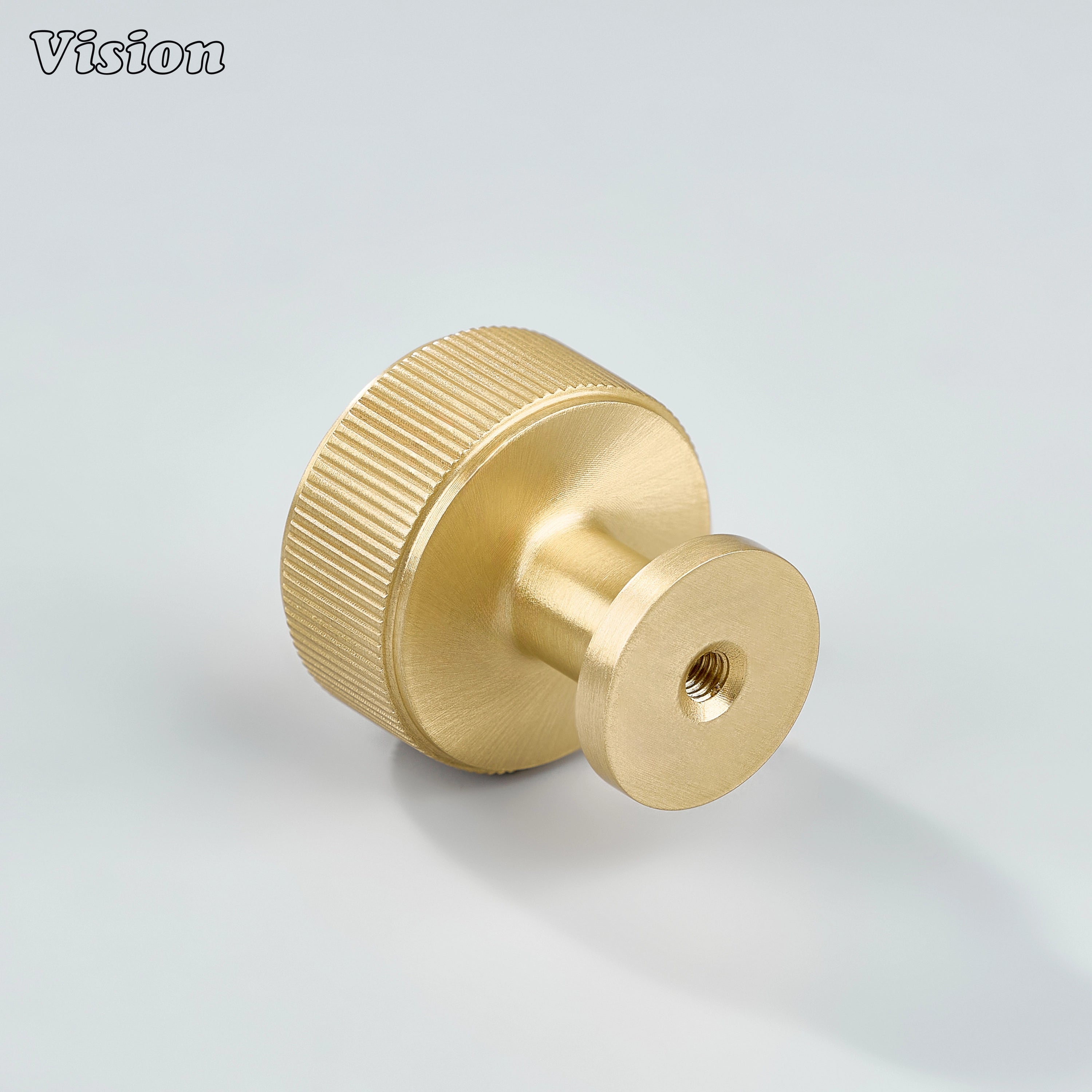 Gold finished linear knurled brass round cabinet knob designed for drawer and cabinet applications