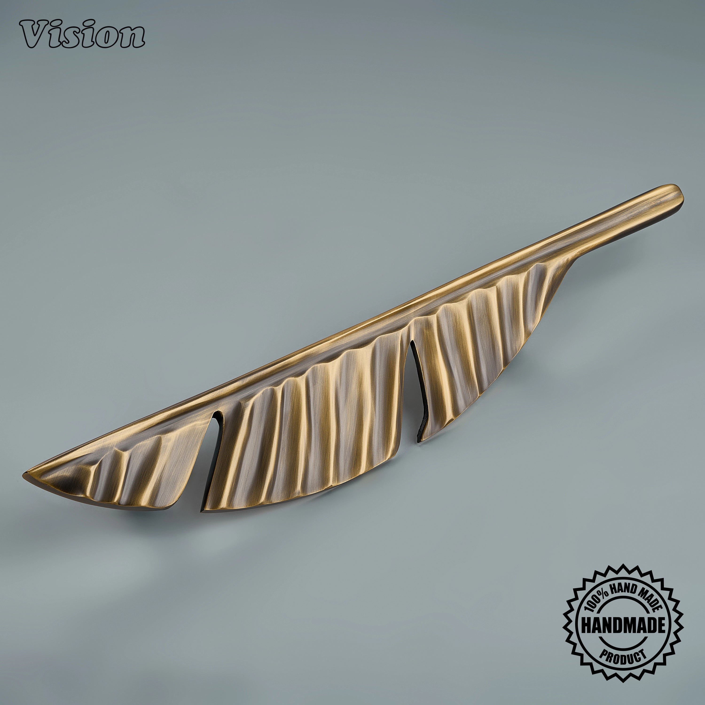 Antique Bronze handcrafted solid brass cabinet appliance pull with leaf-inspired fluted profile for kitchen cabinets.