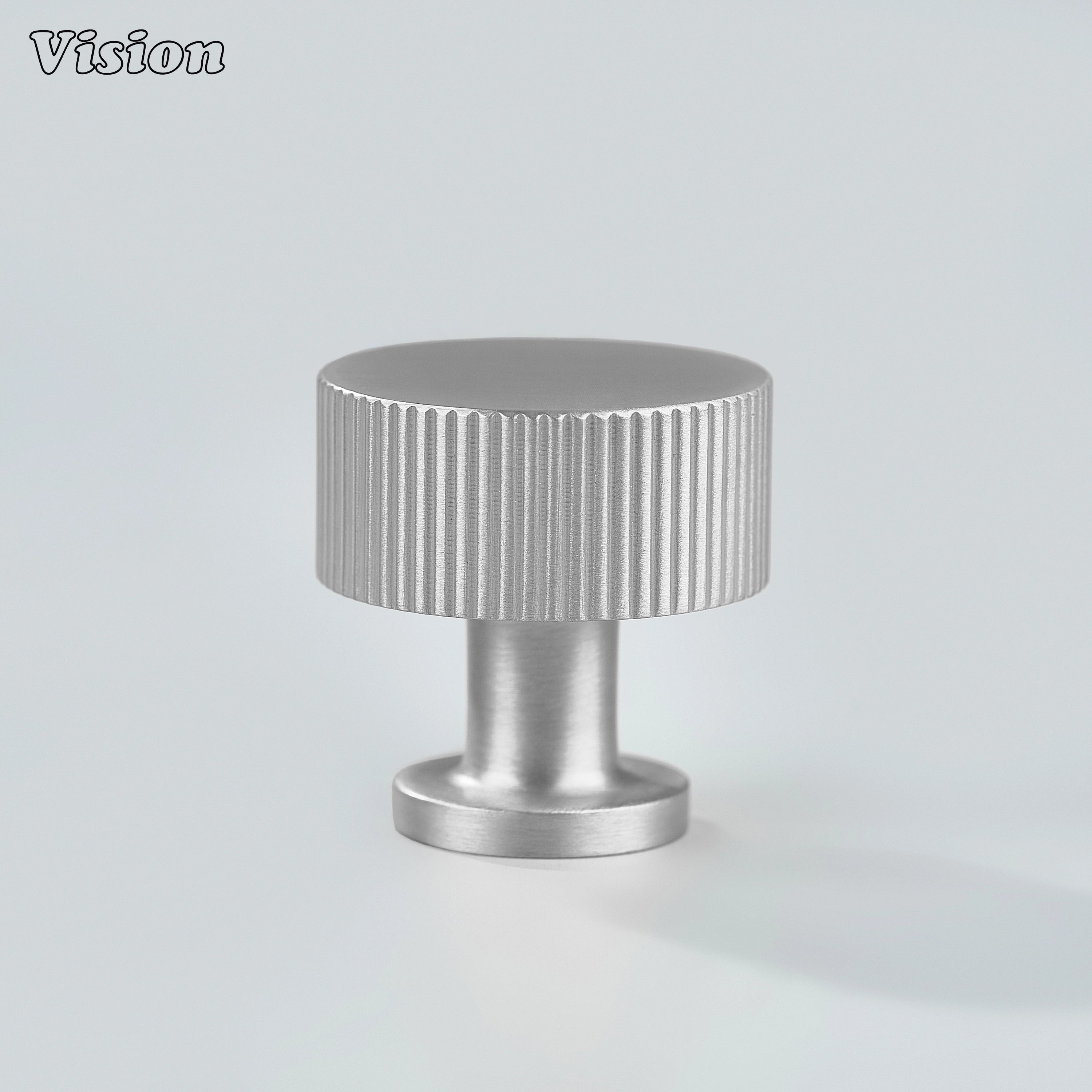 Round Silver cabinet knob with textured linear surface for wardrobe doors