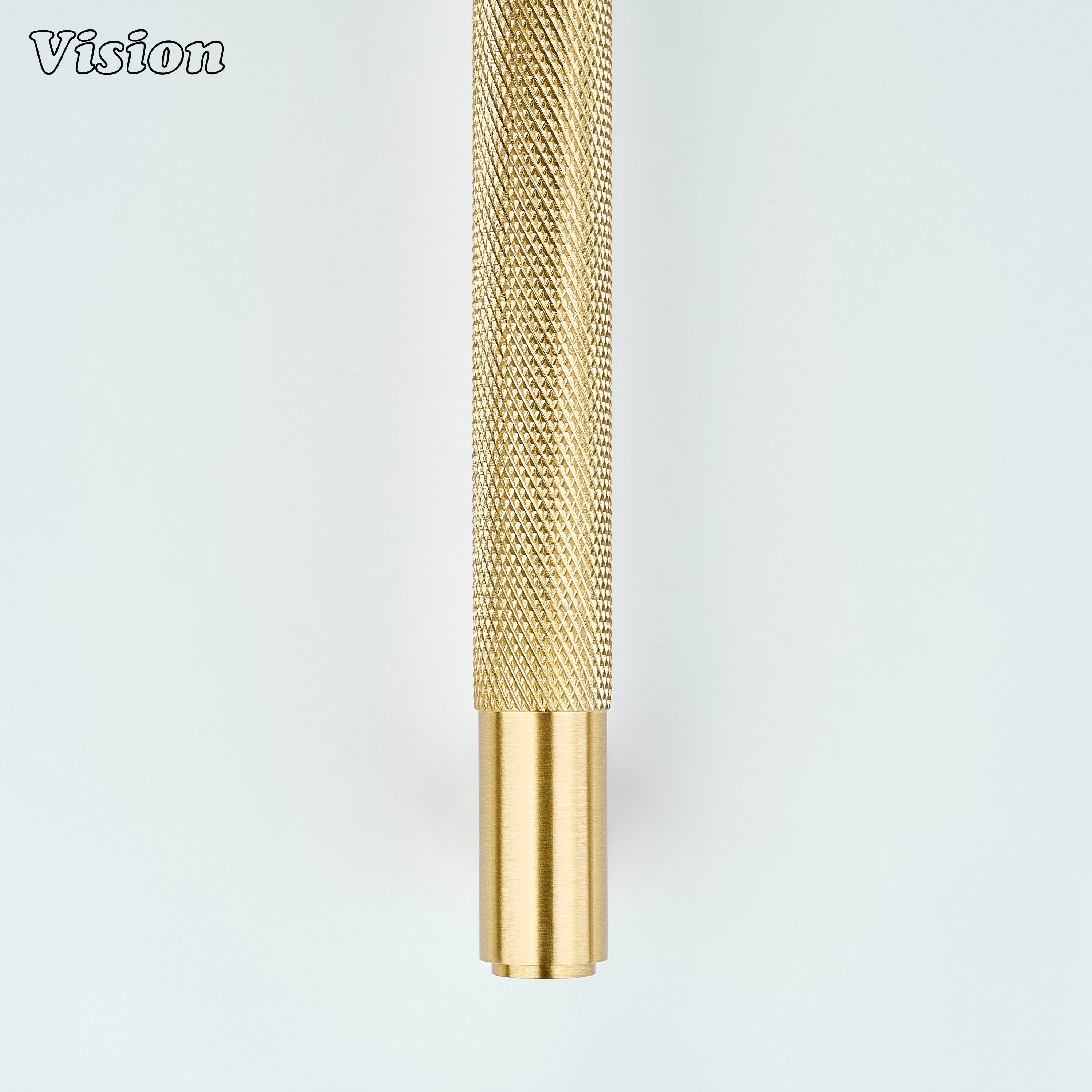 Knurled gold cabinet handle with cylindrical bar design for kitchen storage