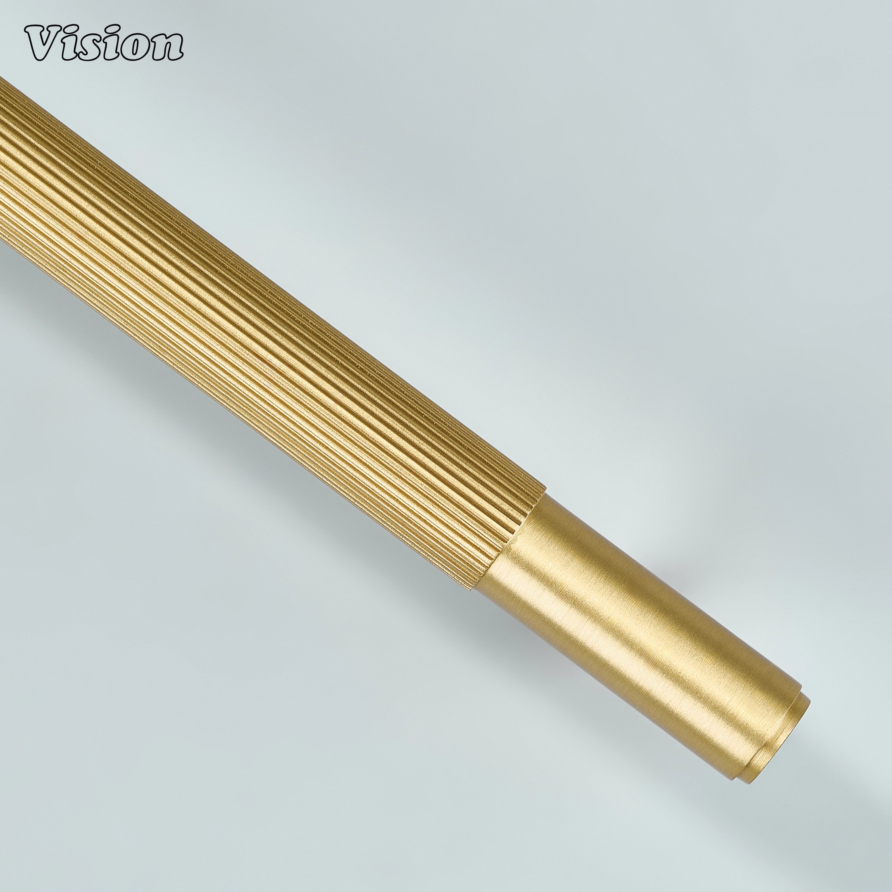 Modern gold linear handle for home interior cabinetry.