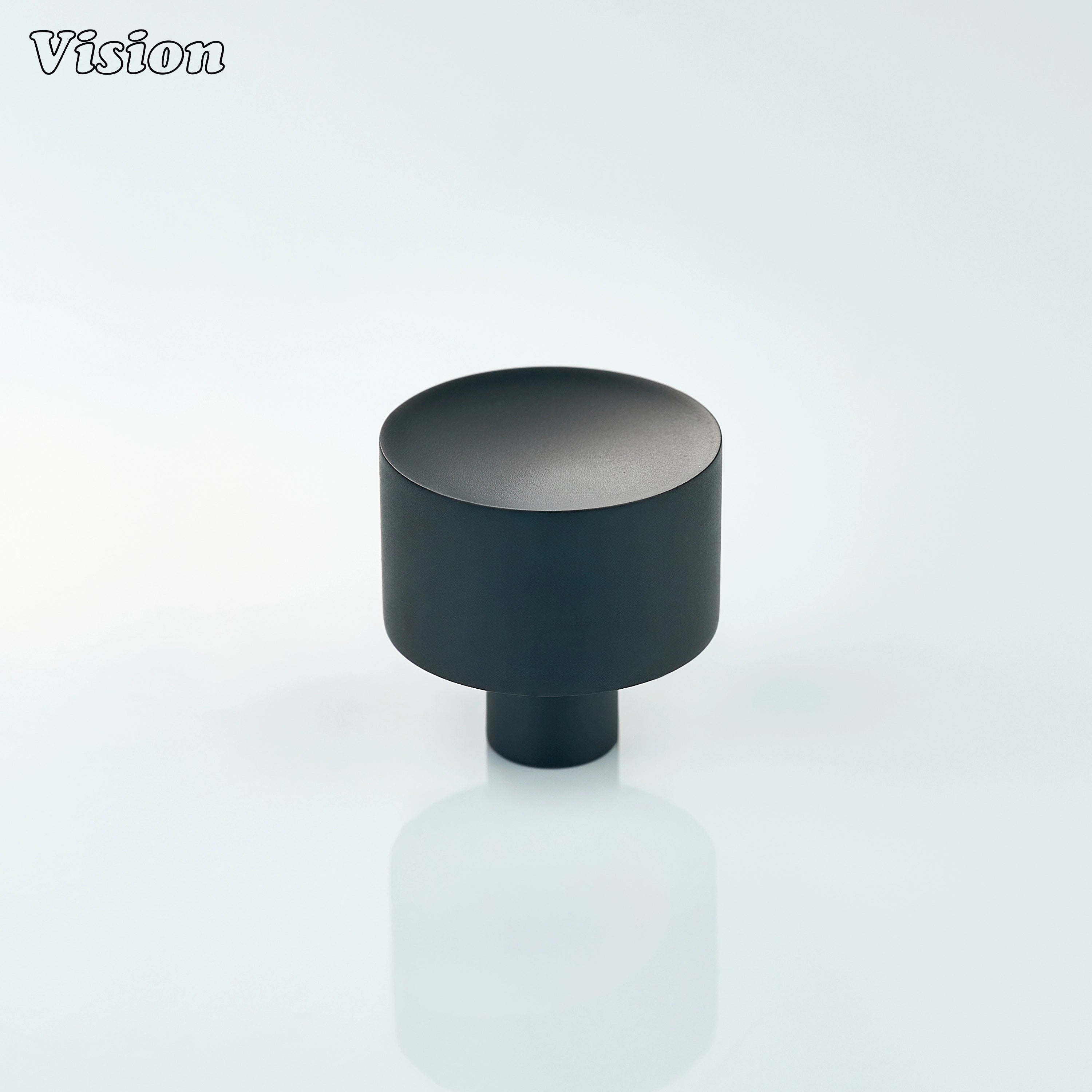 Black round cabinet knob crafted from solid brass for modern cabinets