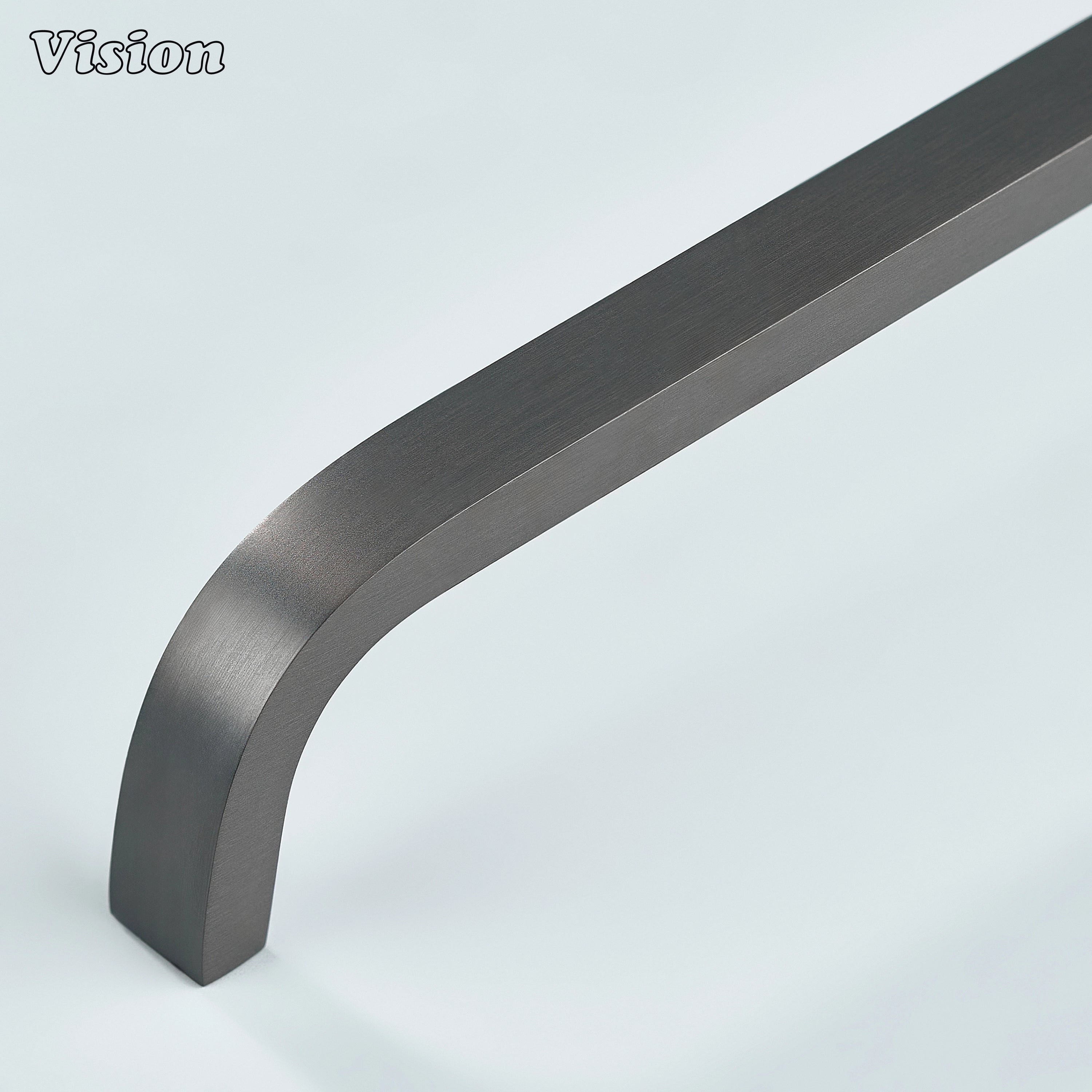 Gunmetal curved brass cabinet handle for modern interiors.