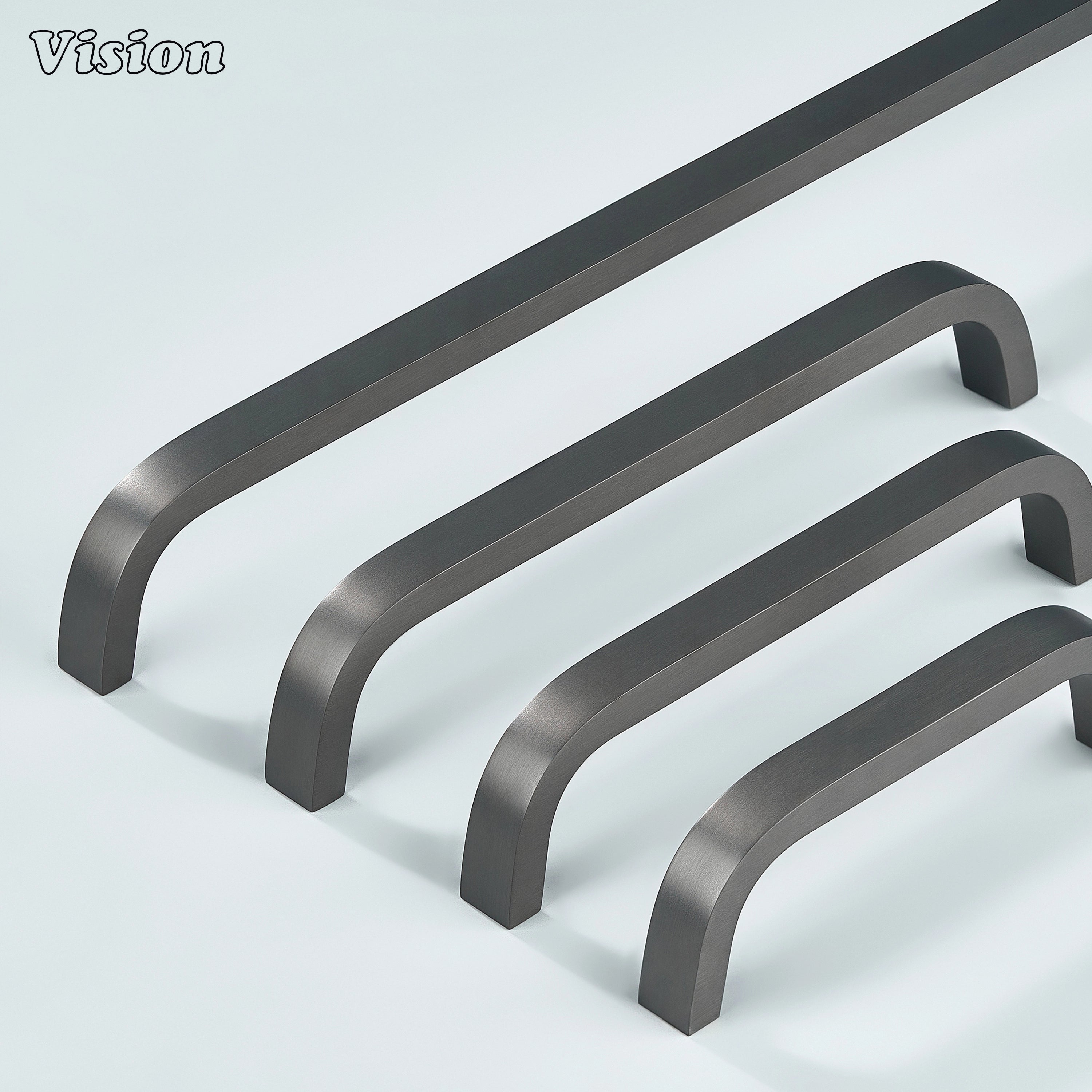 Sleek brass handle in gunmetal finish for wardrobes and furniture.