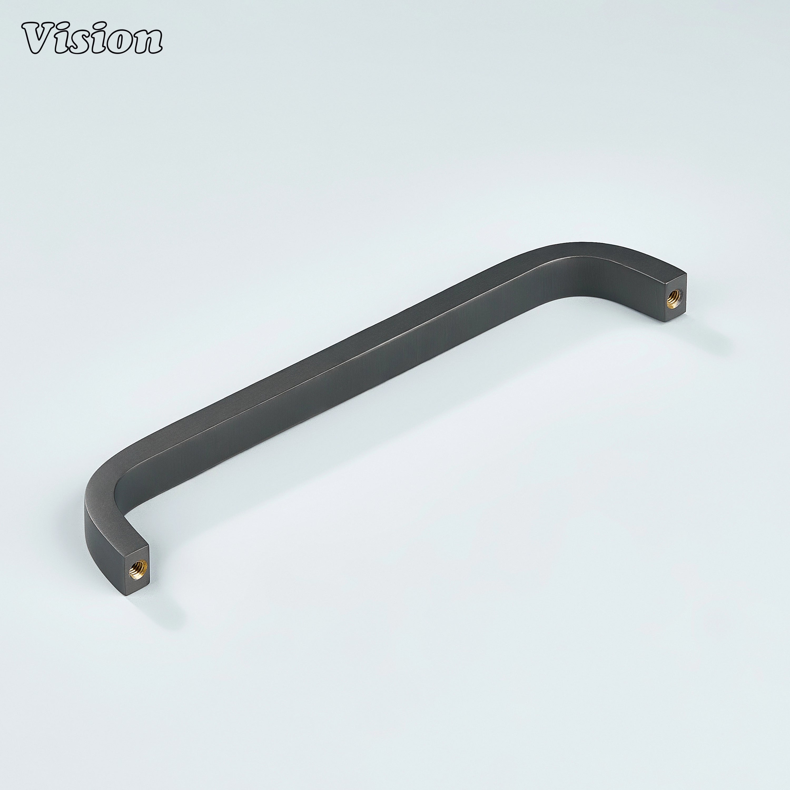 Gunmetal curved pull for contemporary kitchen and drawers.