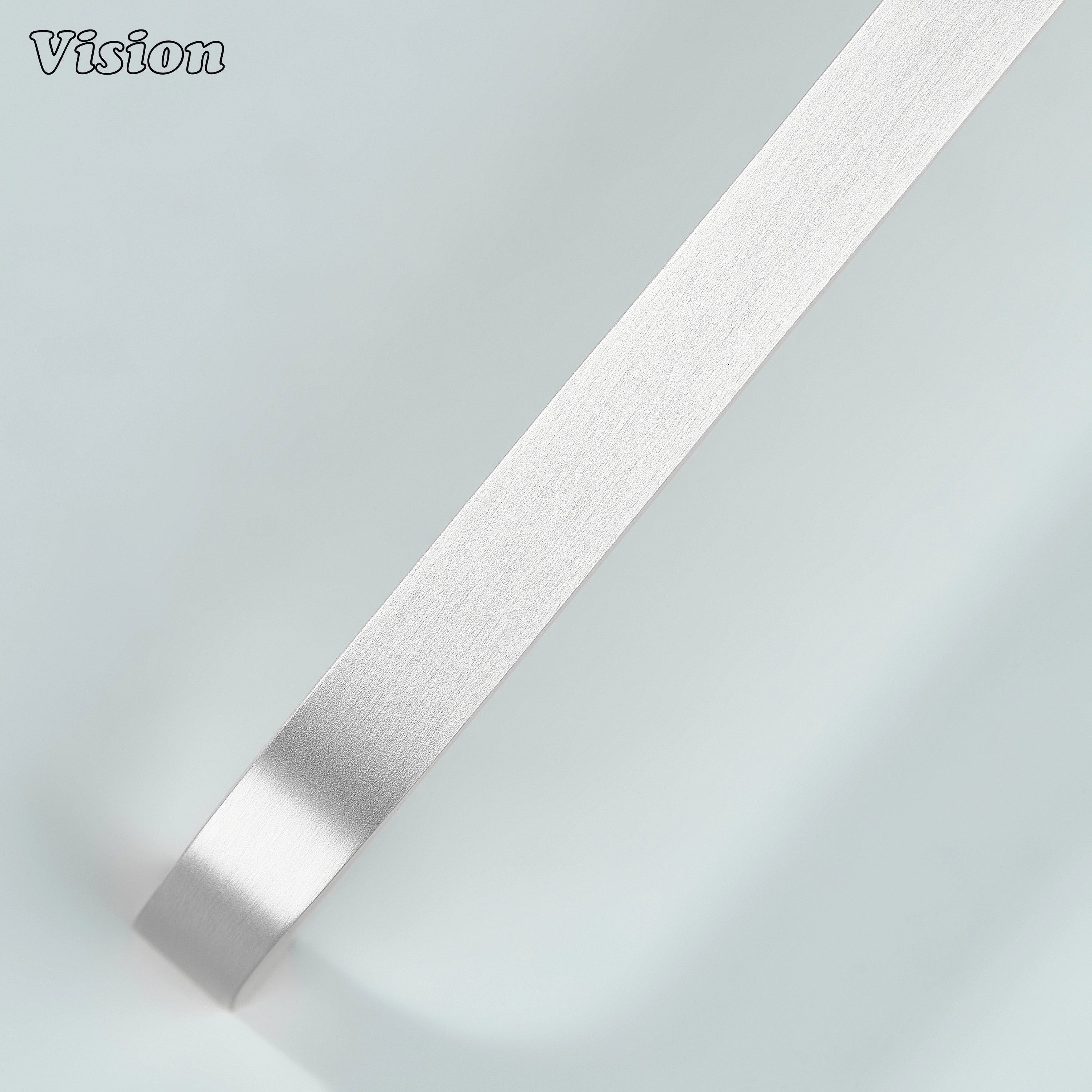 Modern silver curved brass pull for kitchen interiors.