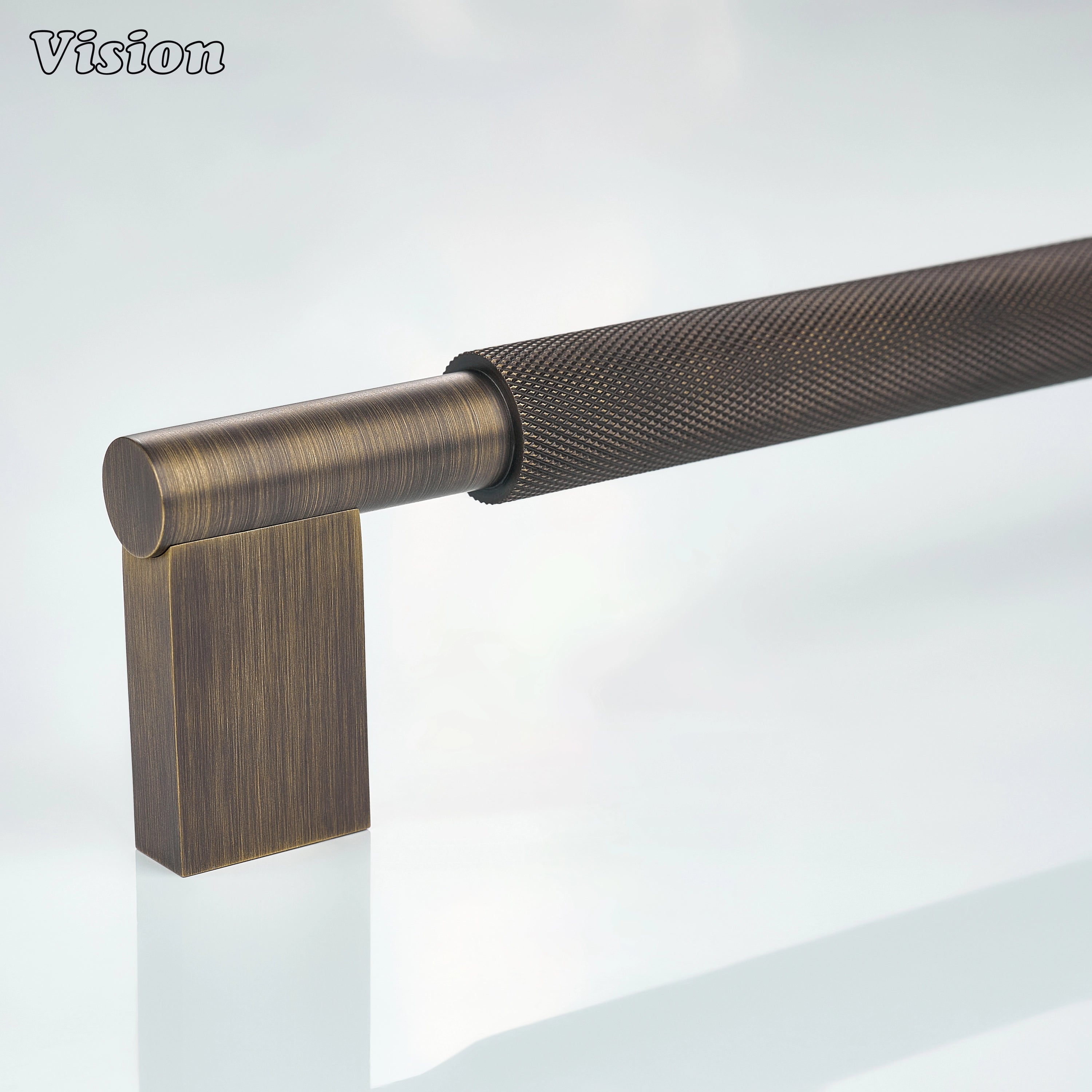 Antique Bronze knurled appliance pull with textured bar for panel-ready refrigerators.