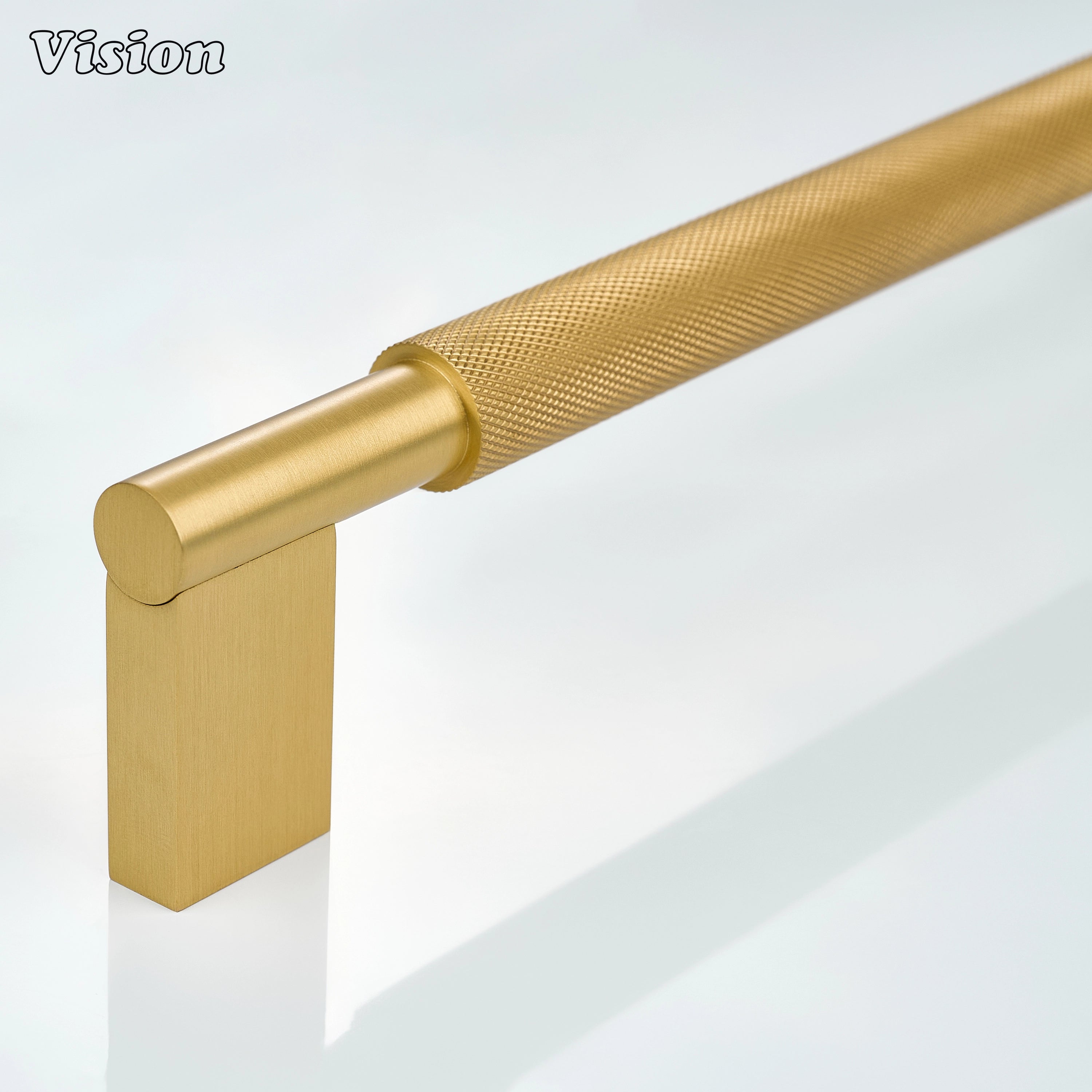 Gold knurled appliance pull with textured bar and rectangular supports for panel-ready refrigerators.