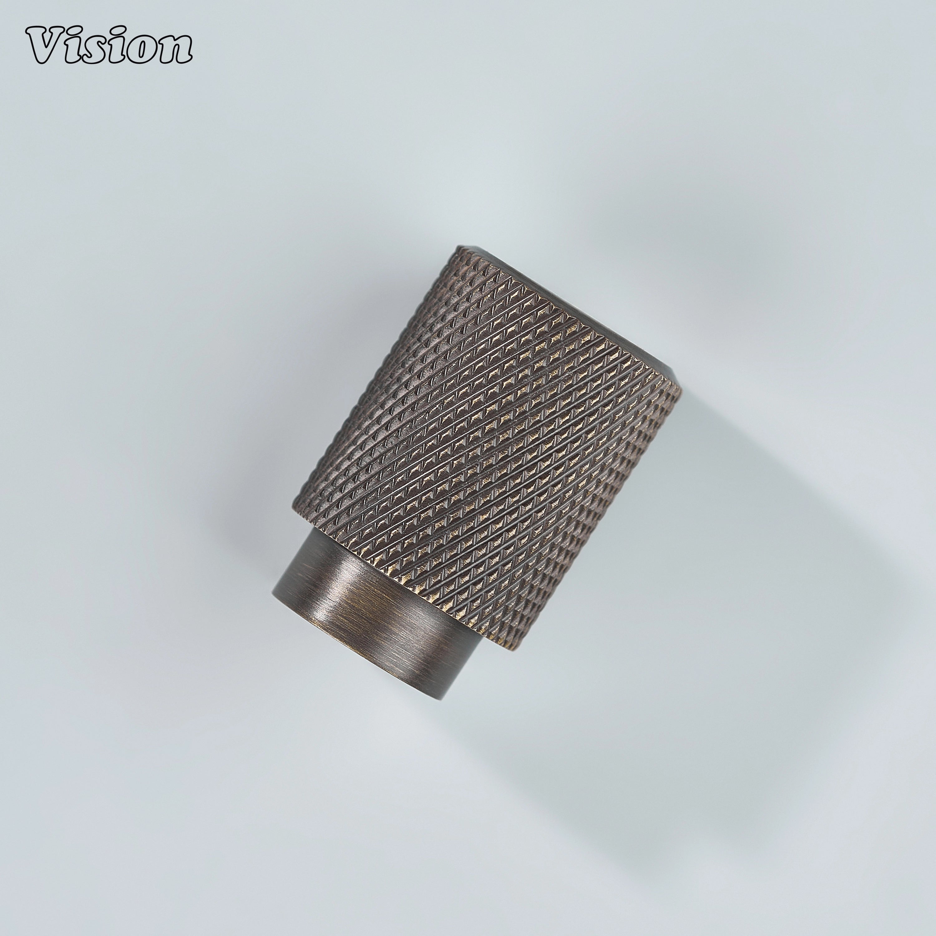 Modern antique bronze knurled cylinder knob used for closet doors.