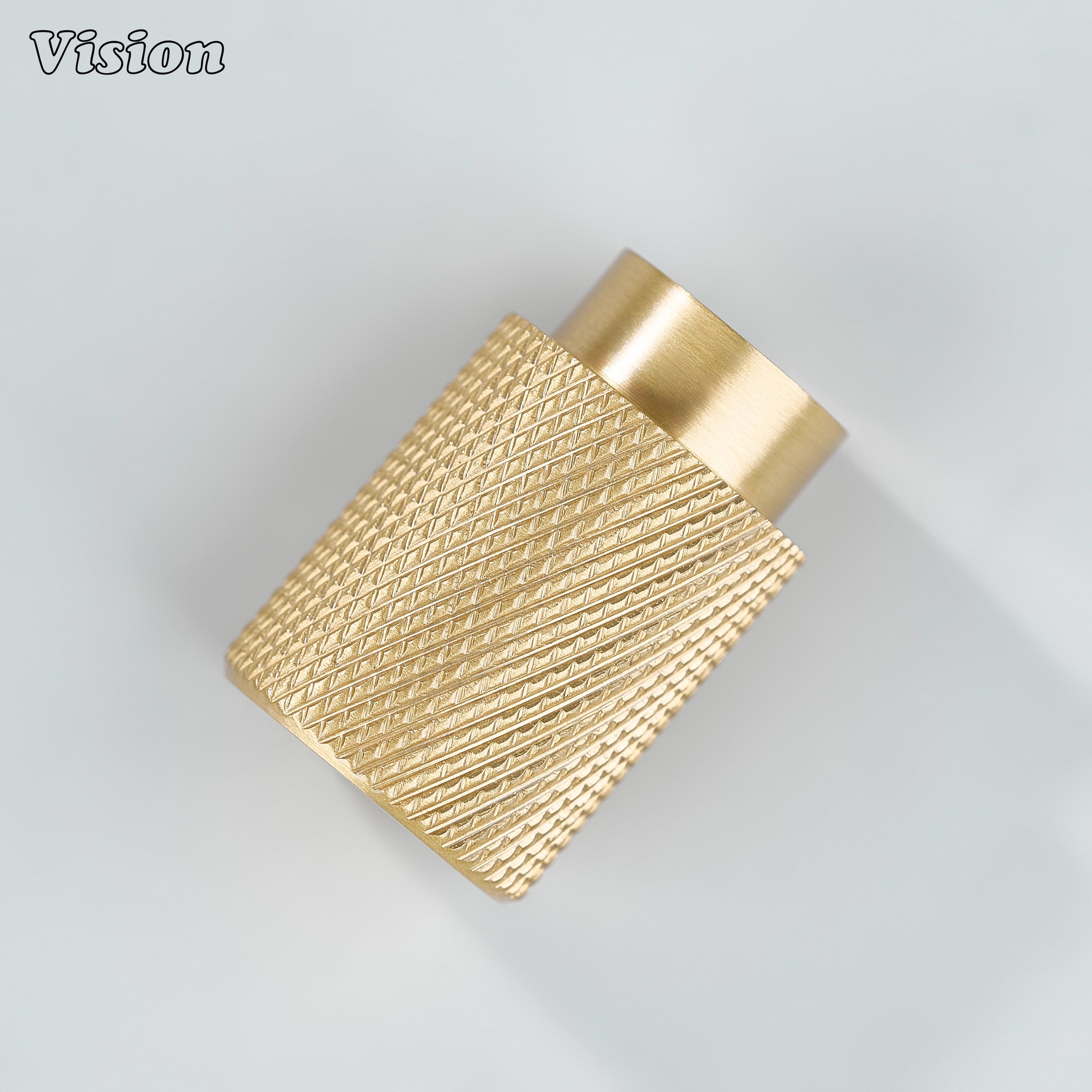 Modern gold knurled cylinder knob used for closet doors.