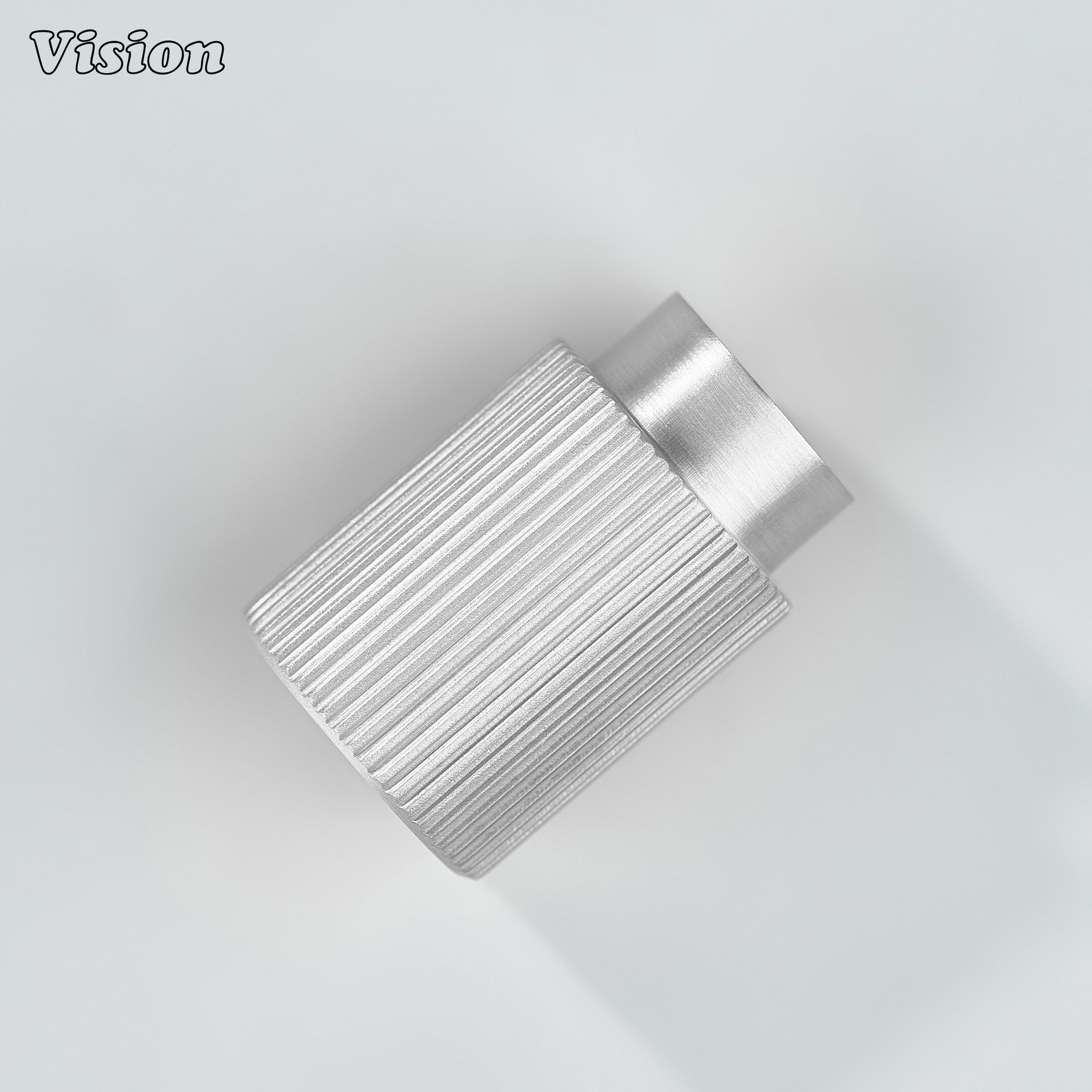 Silver knurled cabinet knob in cylindrical profile for kitchen drawers