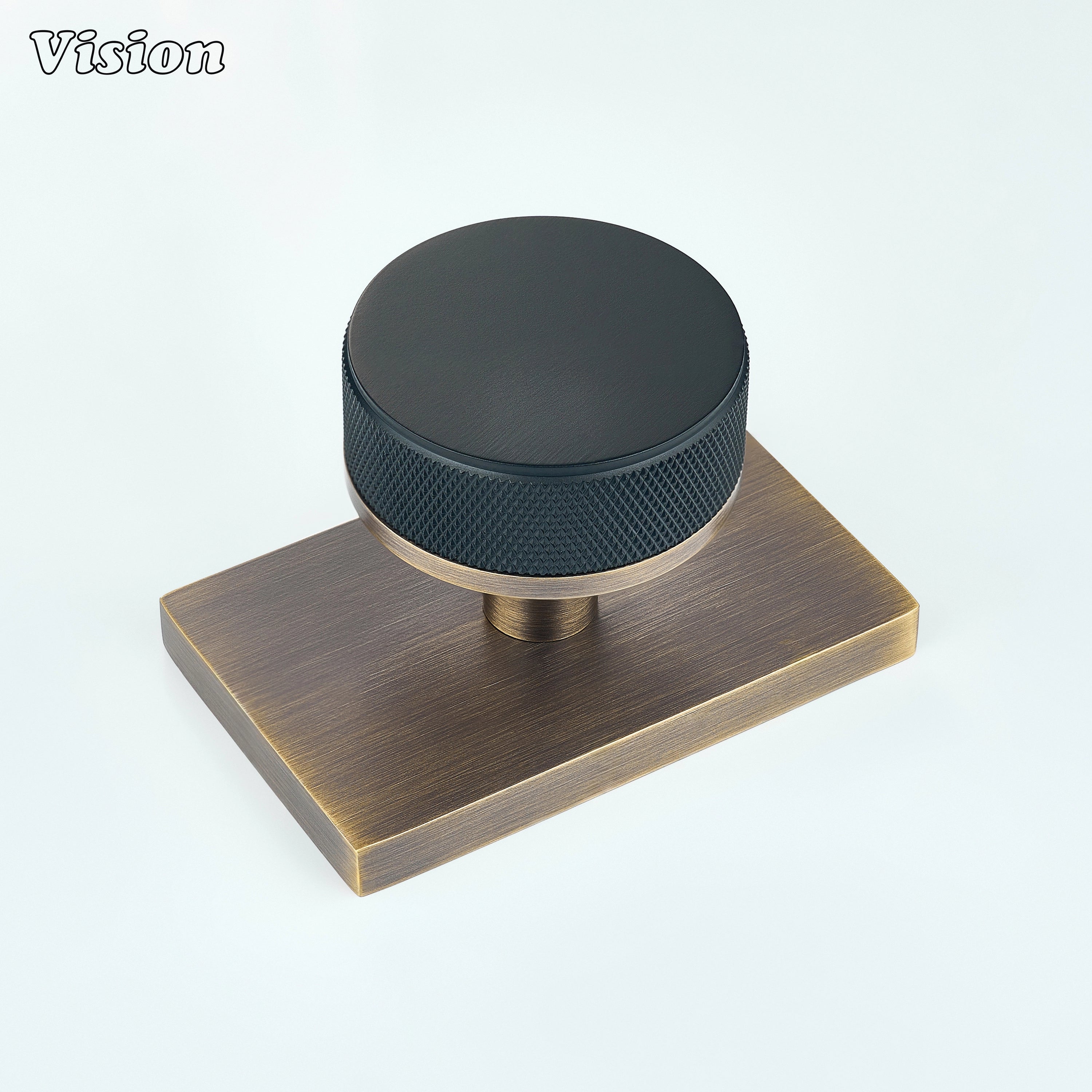Black and Antique Bronze knurled round door knob with black knob and antique bronze backplate
