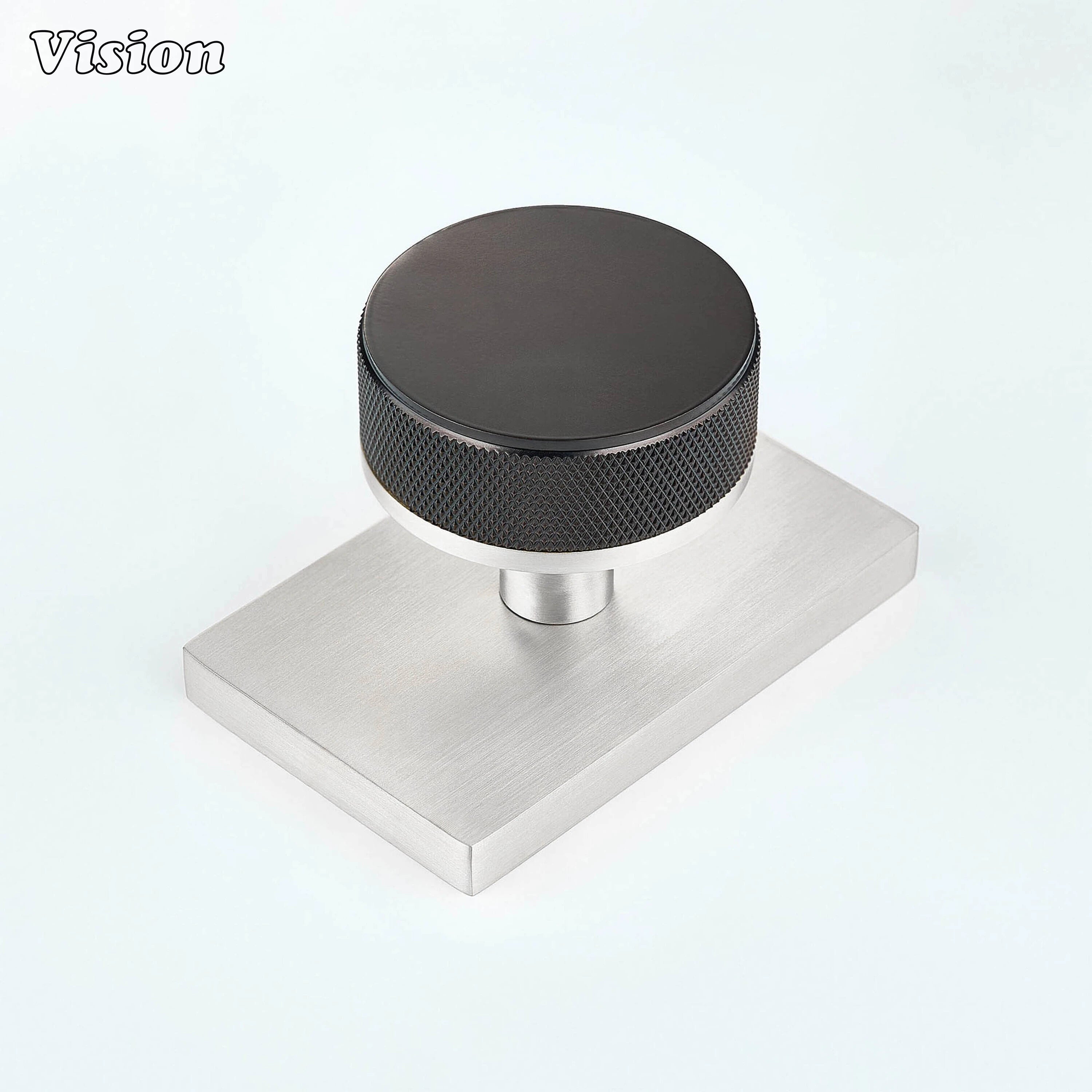 Oil Rubbed Bronze and Silver knurled round door knob with bronze knob and silver rectangular backplate
