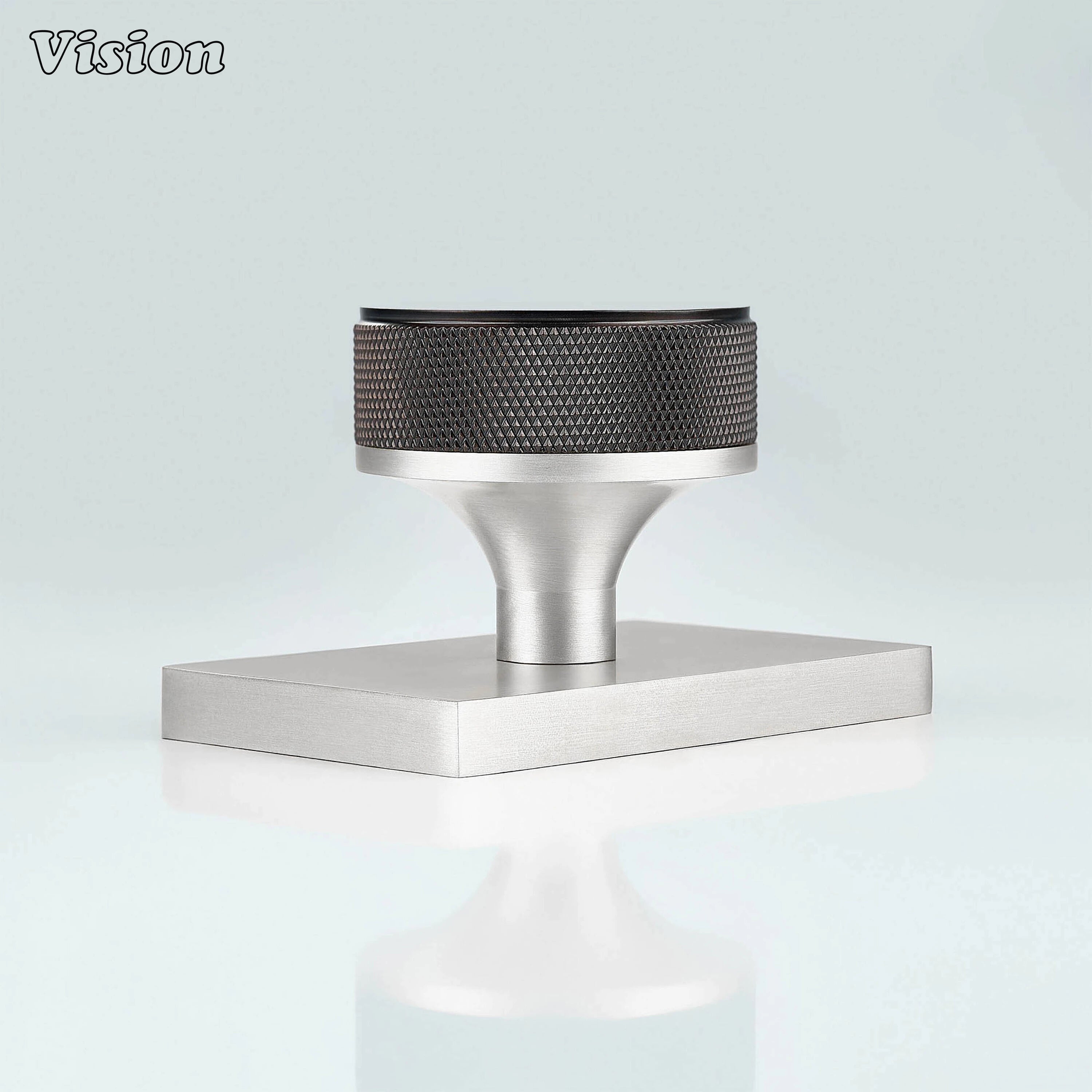 Oil Rubbed Bronze and Silver door knob with knurled grip and silver conceal plate