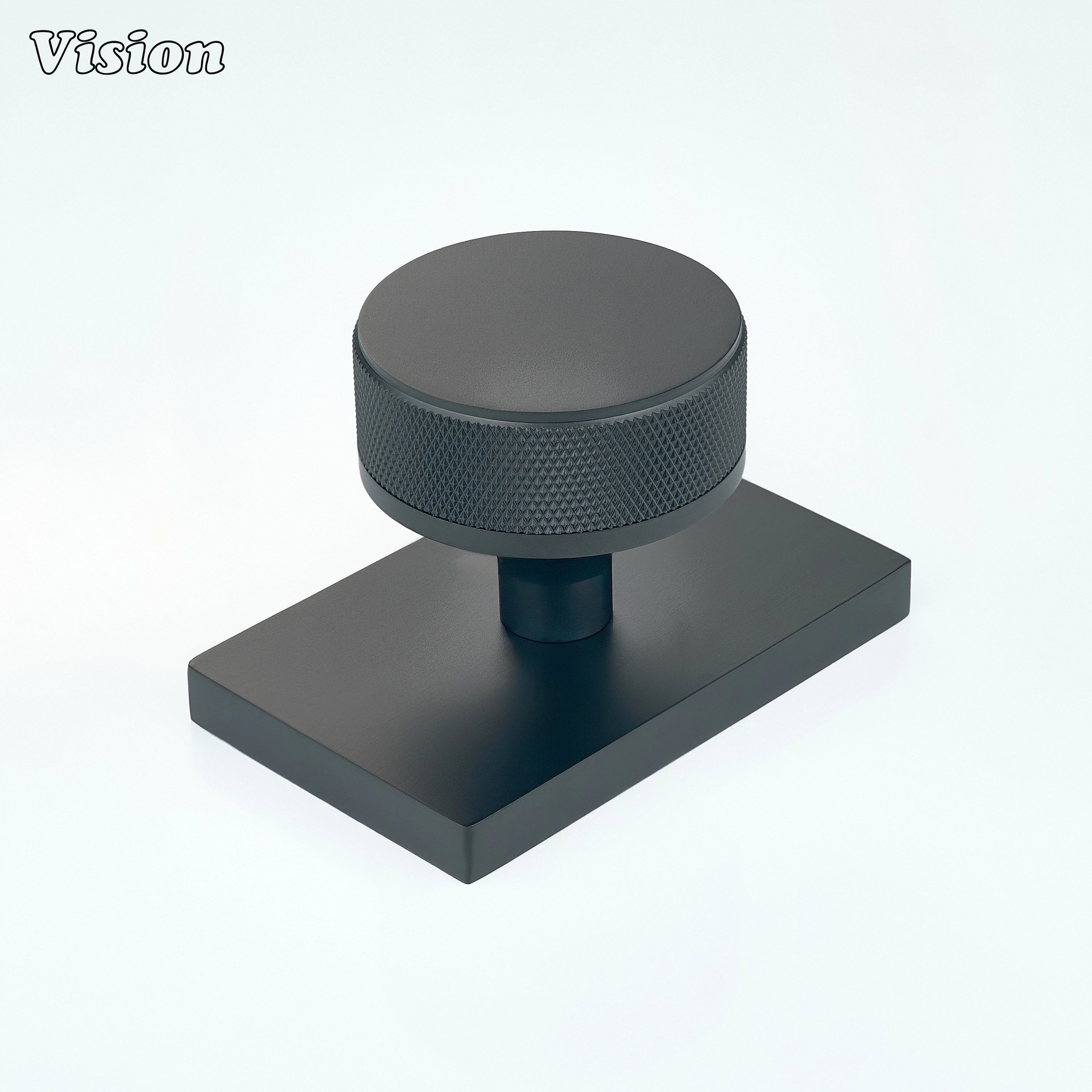 Black knurled round door knob with rectangular backplate for interior doors