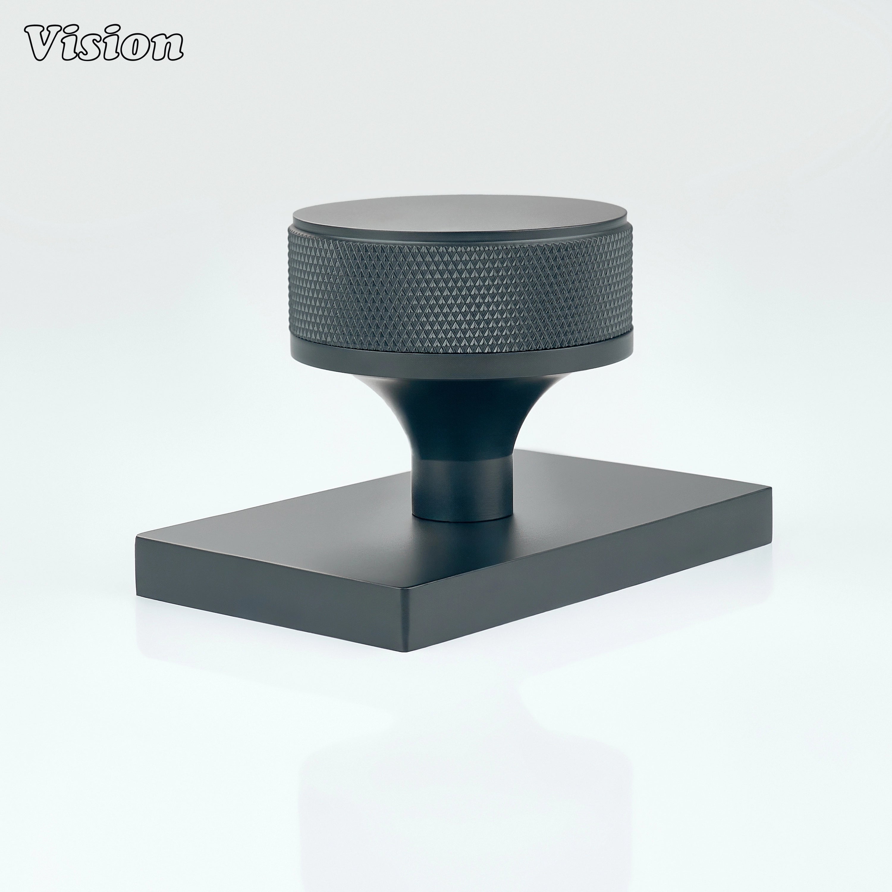 Black knurled door knob and rectangular plate for modern door hardware