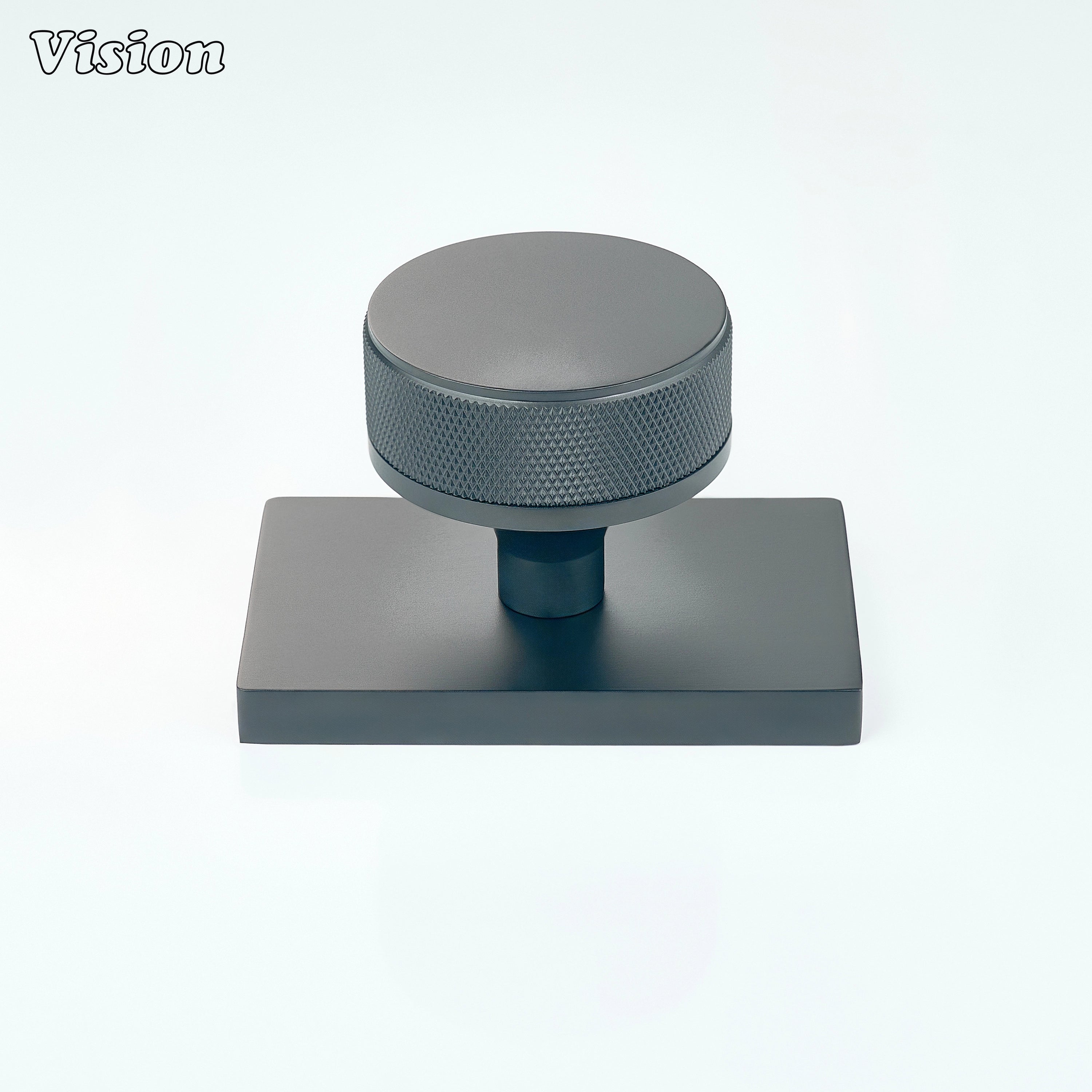 Black knurled door knob with square backplate for residential interiors