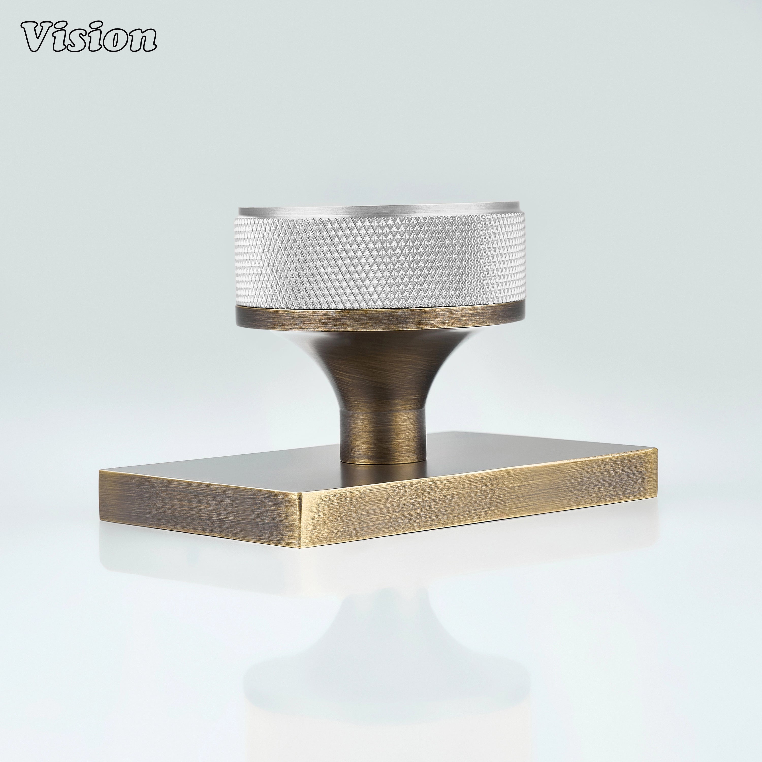 Silver and Antique Bronze door knob with knurled grip and antique bronze conceal plate