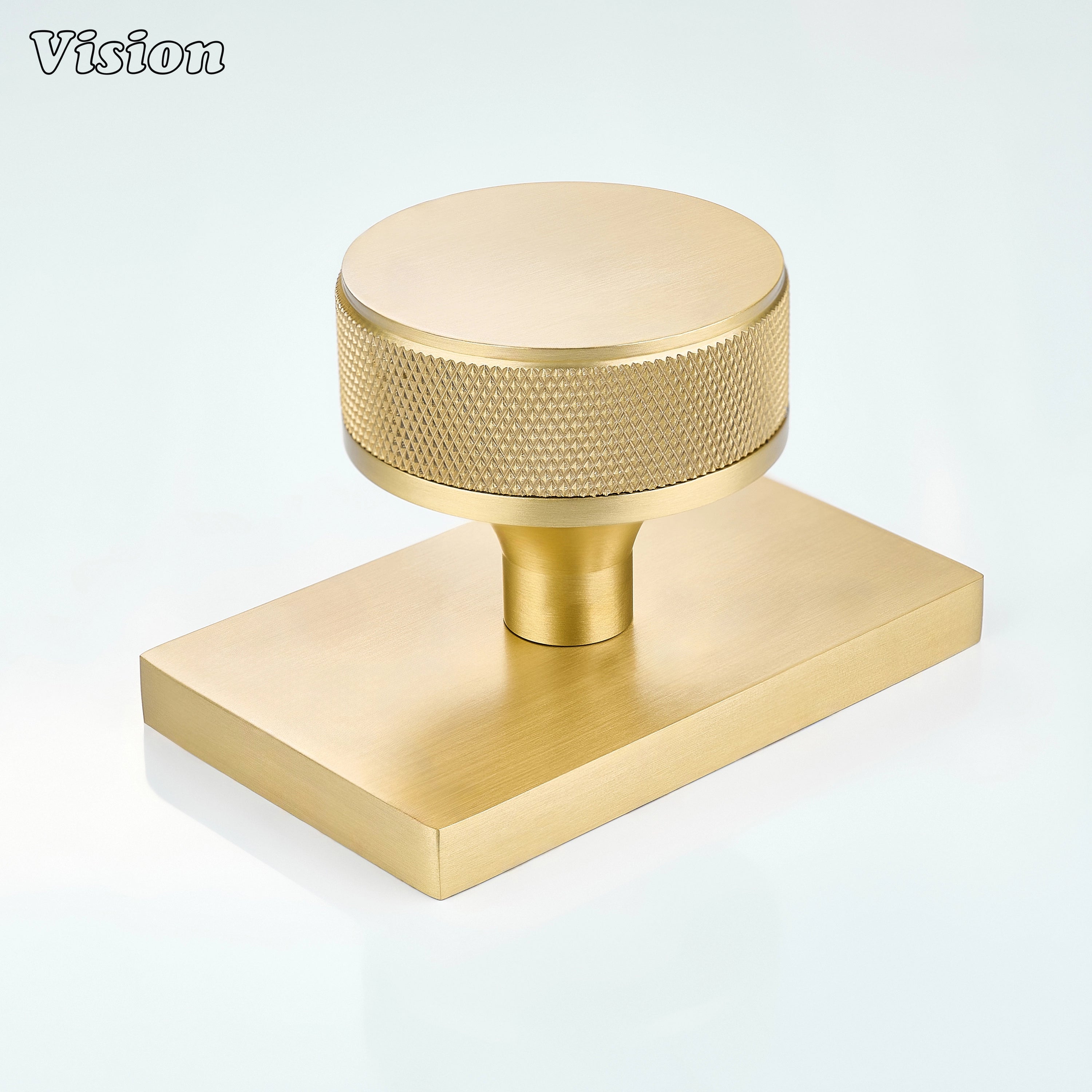 Gold knurled round door knob with rectangular backplate for modern interior doors