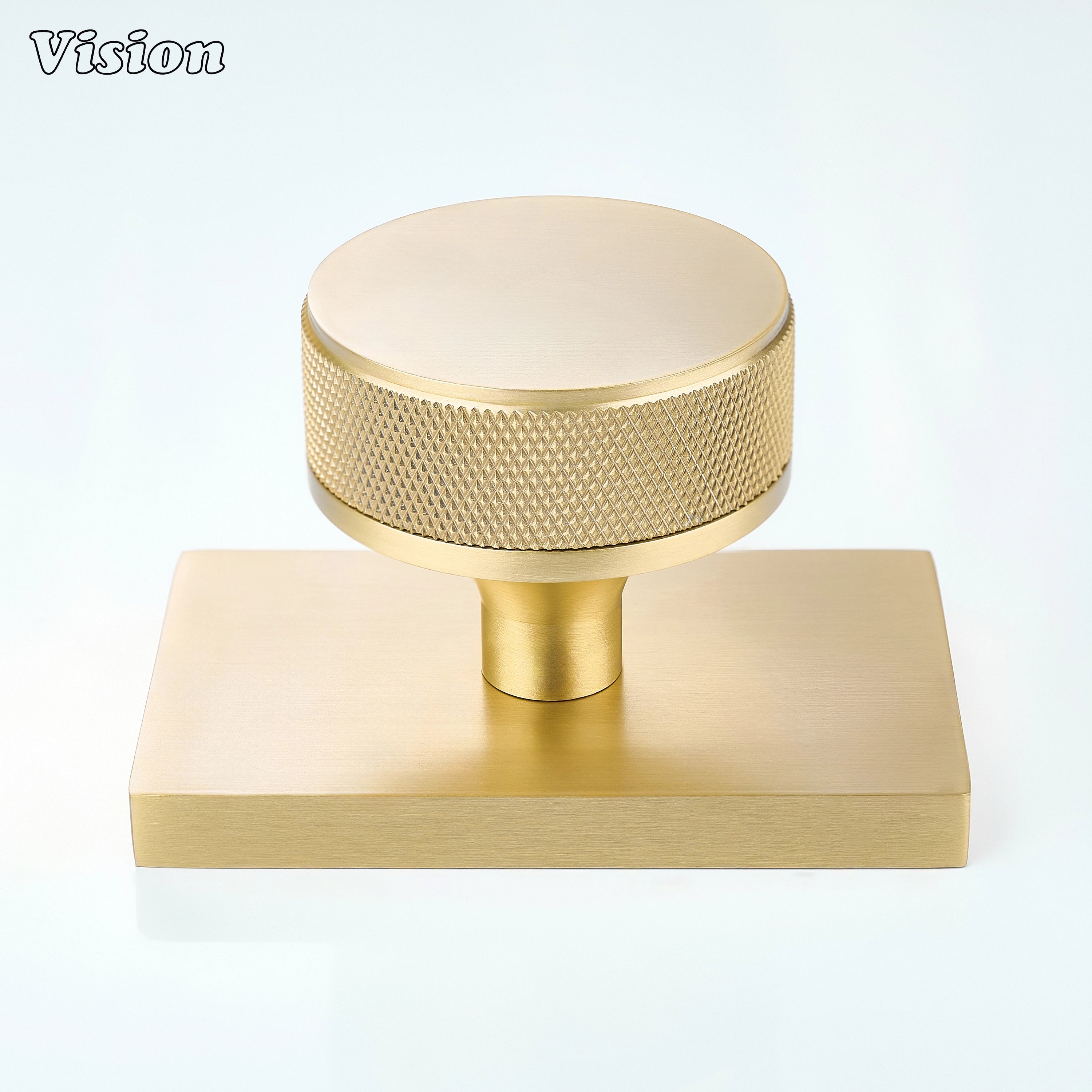 Gold knurled door knob with square backplate for modern and minimalist door setups