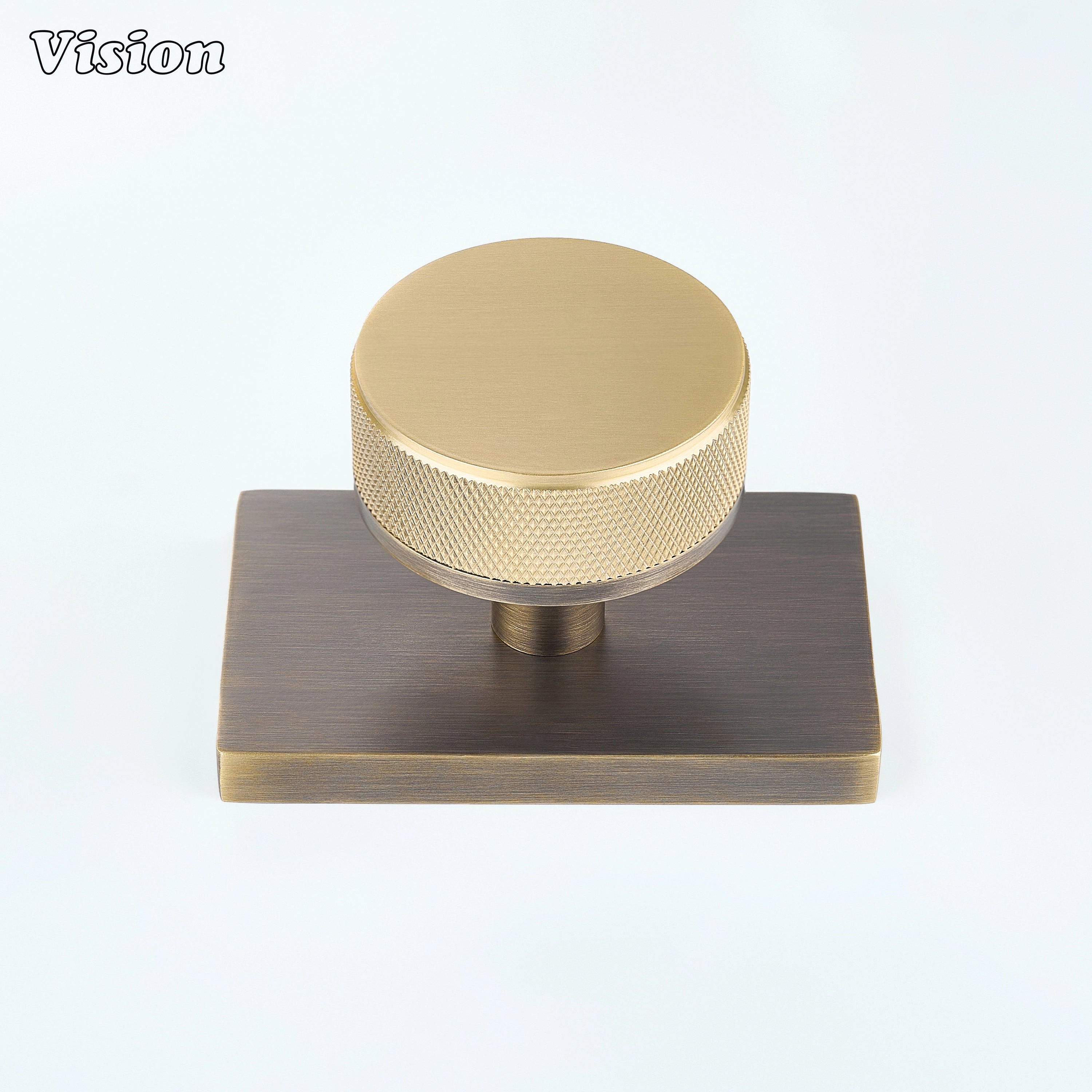 Gold and Antique Bronze knurled door knob with gold top and antique bronze base plate
