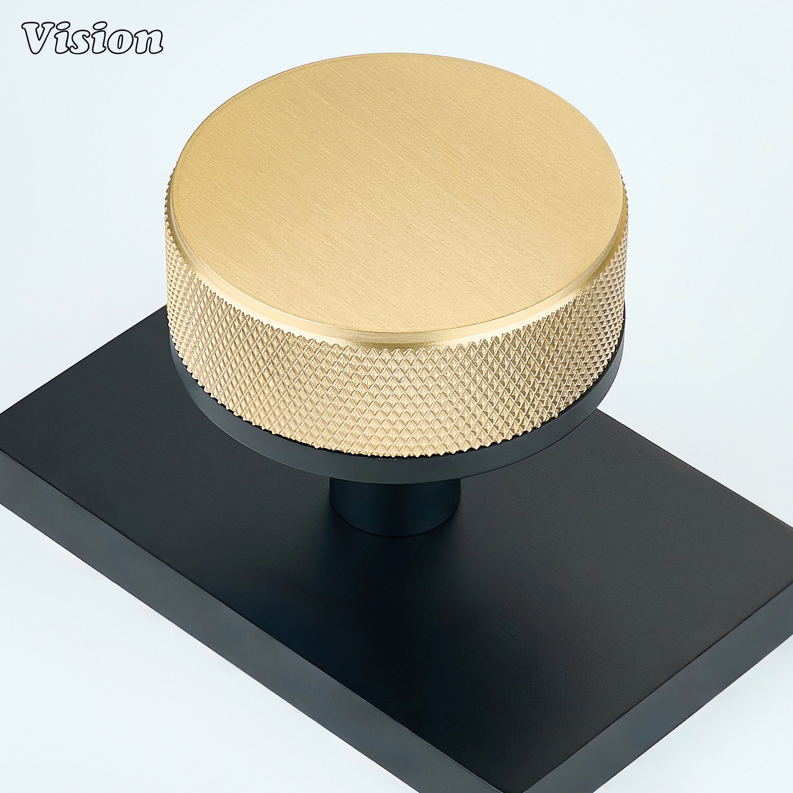 Gold and Black solid brass door knob with contrasting rectangular backplate