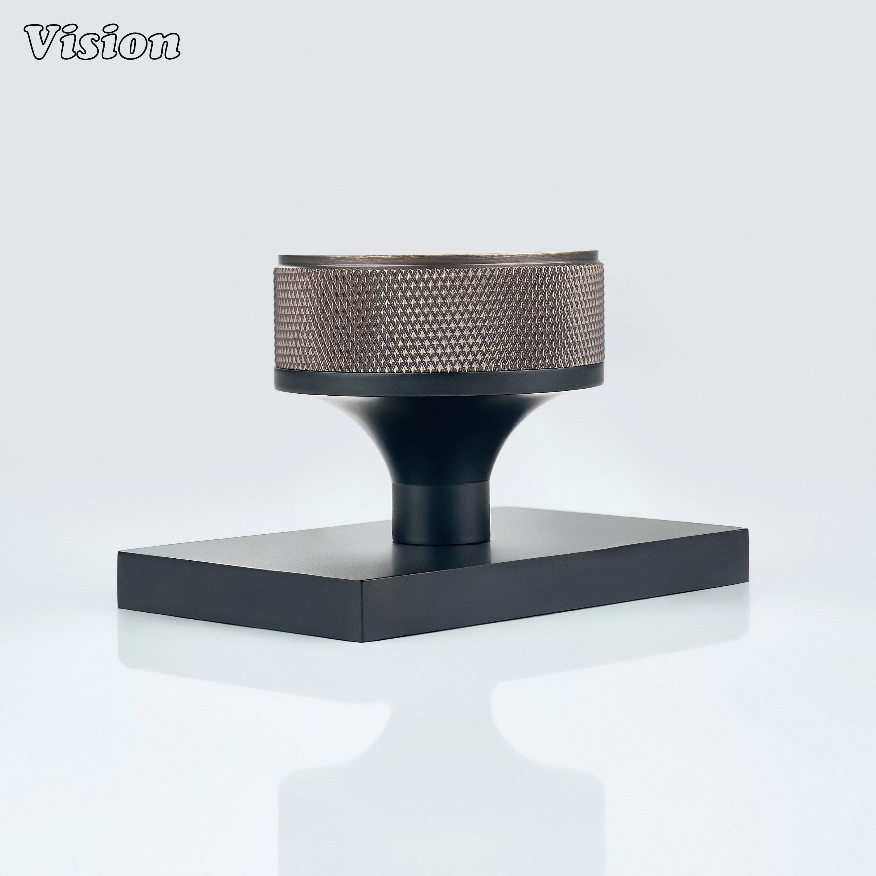 Antique Bronze and Black door knob with knurled grip and black conceal plate