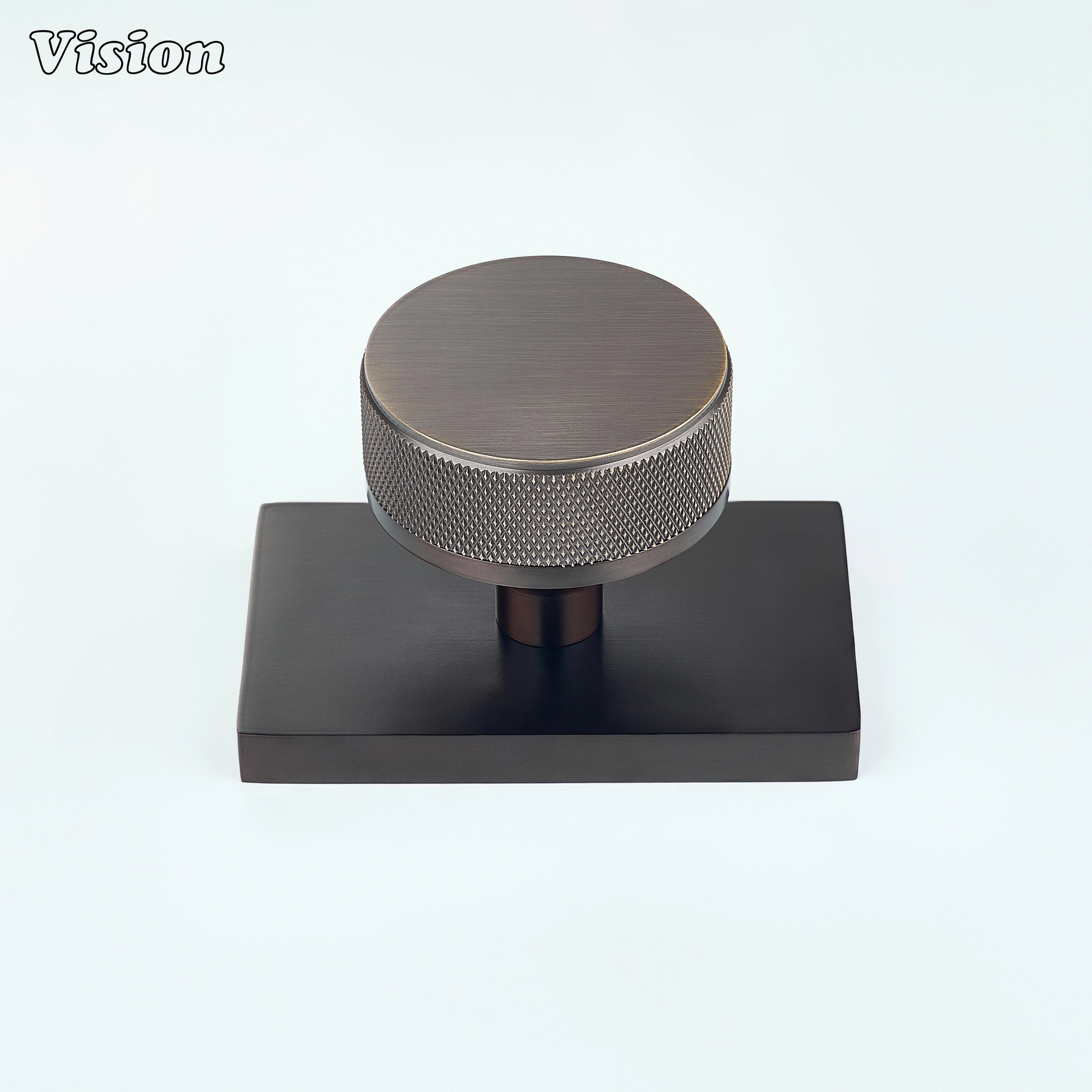 Antique Bronze and Oil Rubbed Bronze knurled door knob designed for industrial interiors