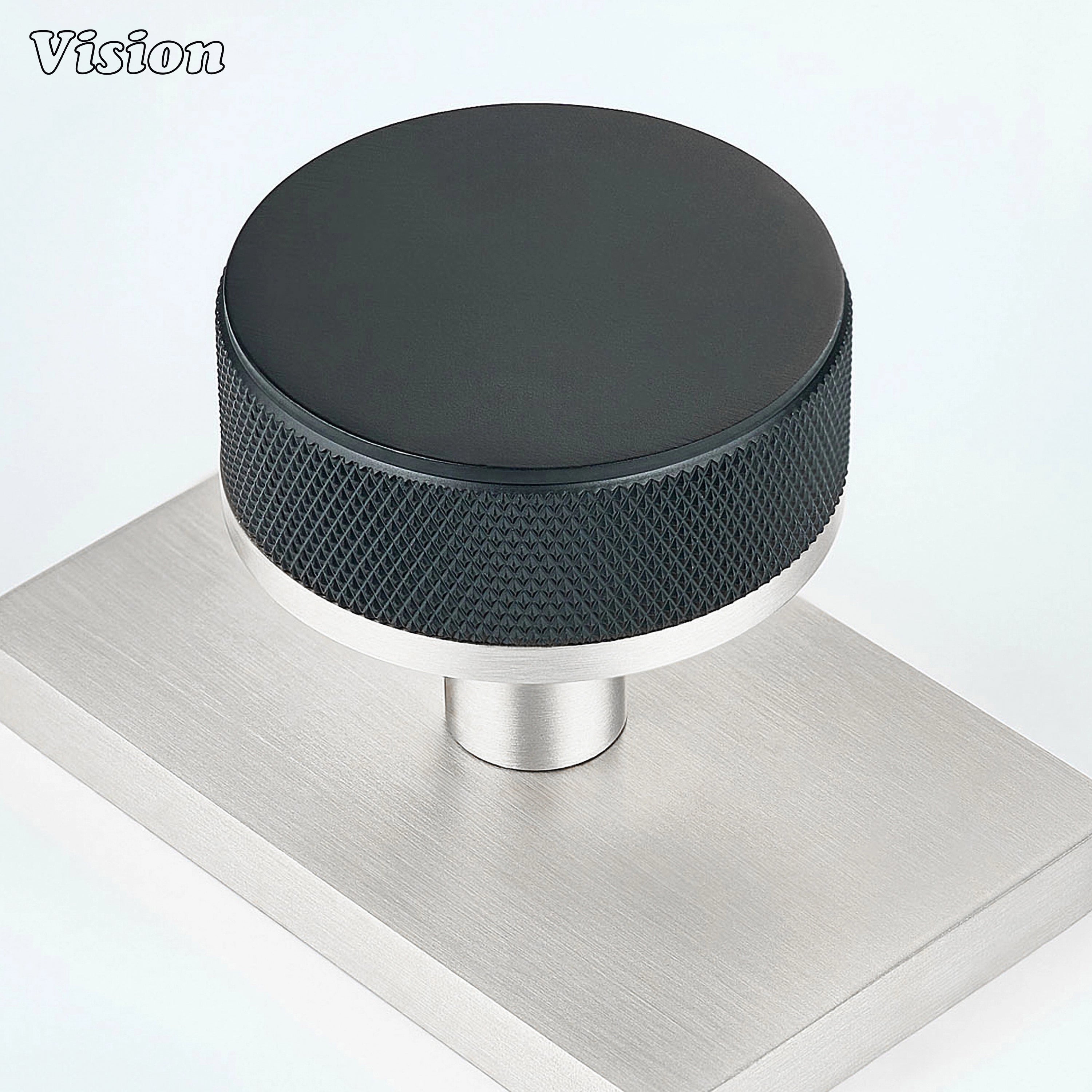 Black and Silver solid brass door knob with contrasting rectangular backplate