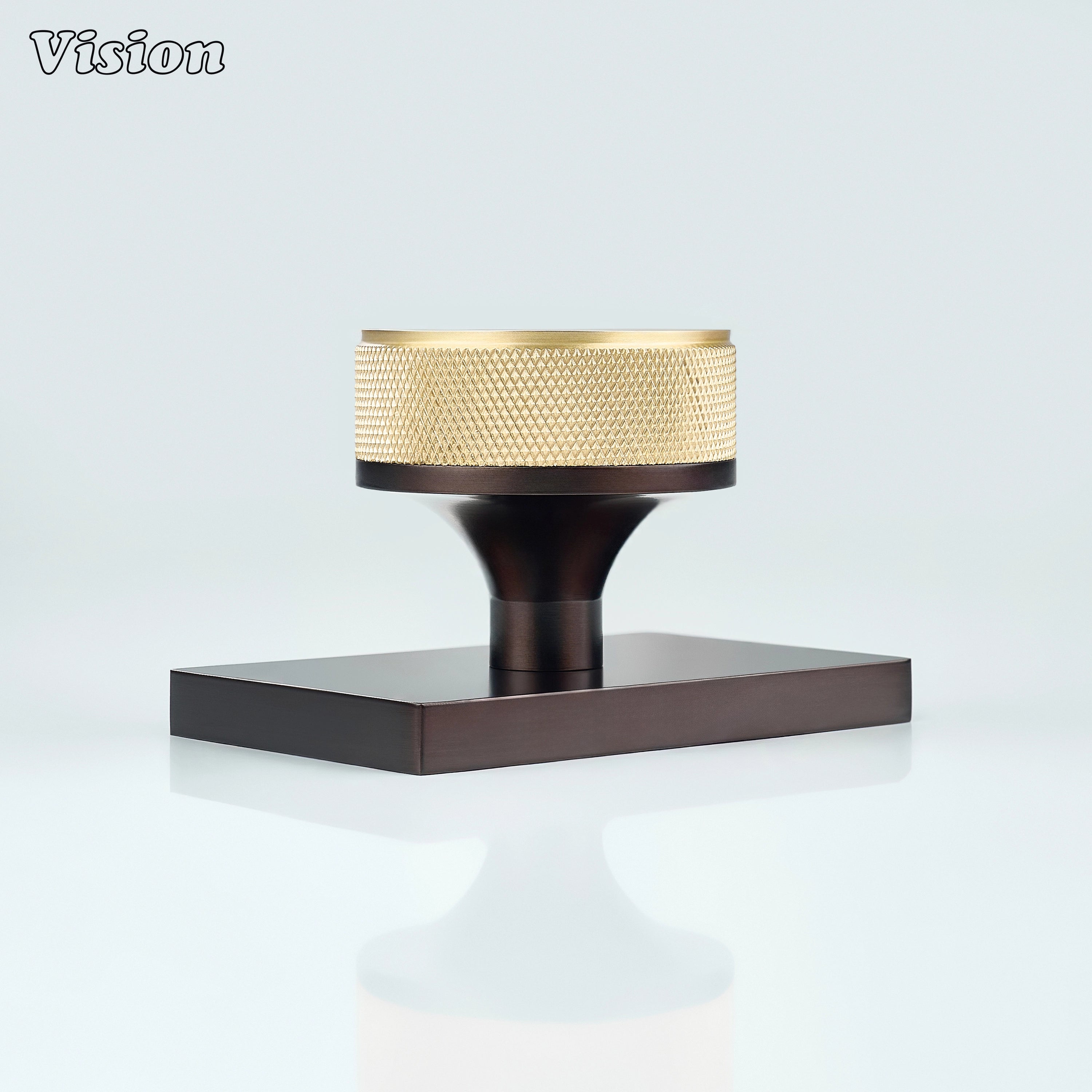Gold and Oil Rubbed Bronze knurled door knob designed for industrial interiors