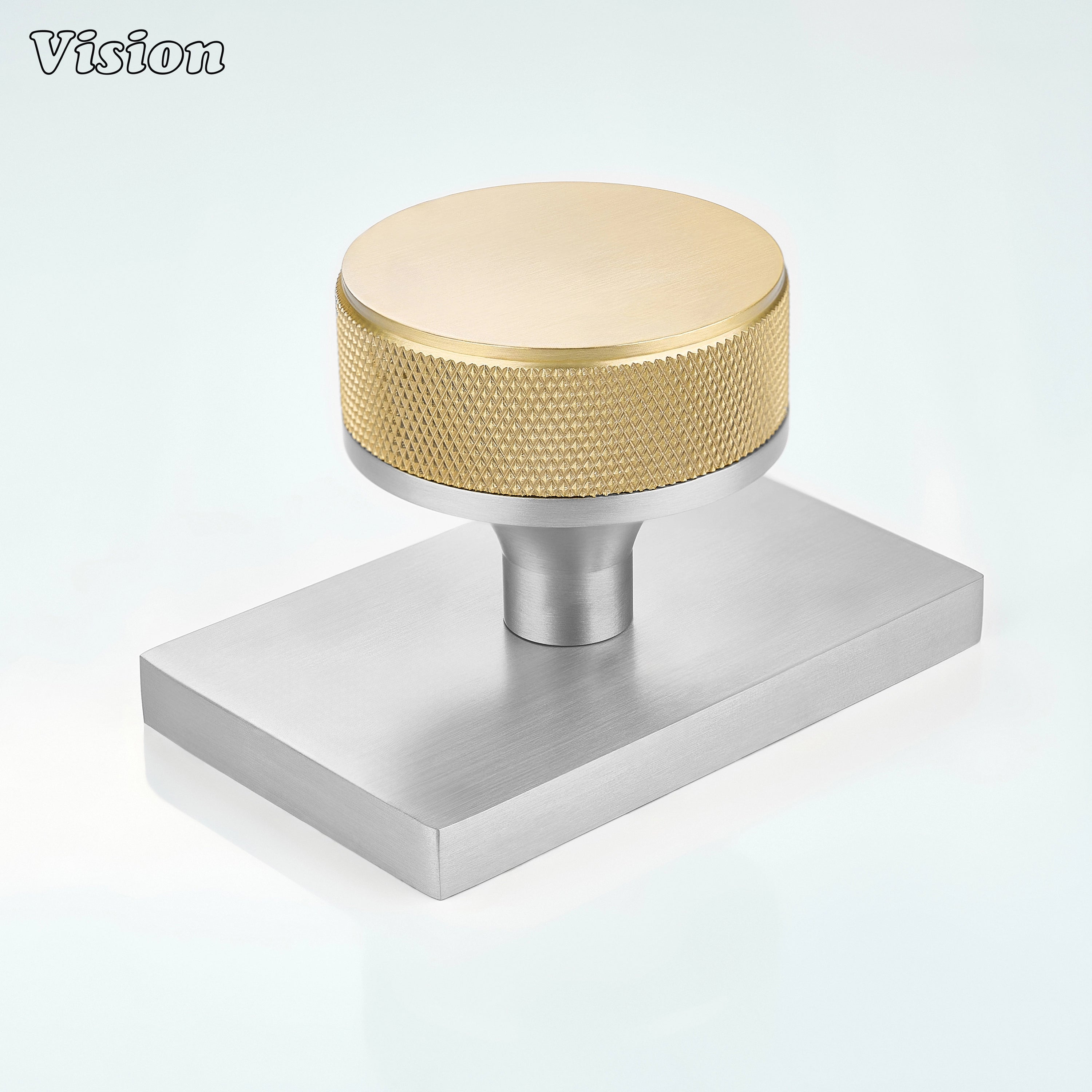 Gold and Silver knurled round door knob with gold knob and silver rectangular backplate