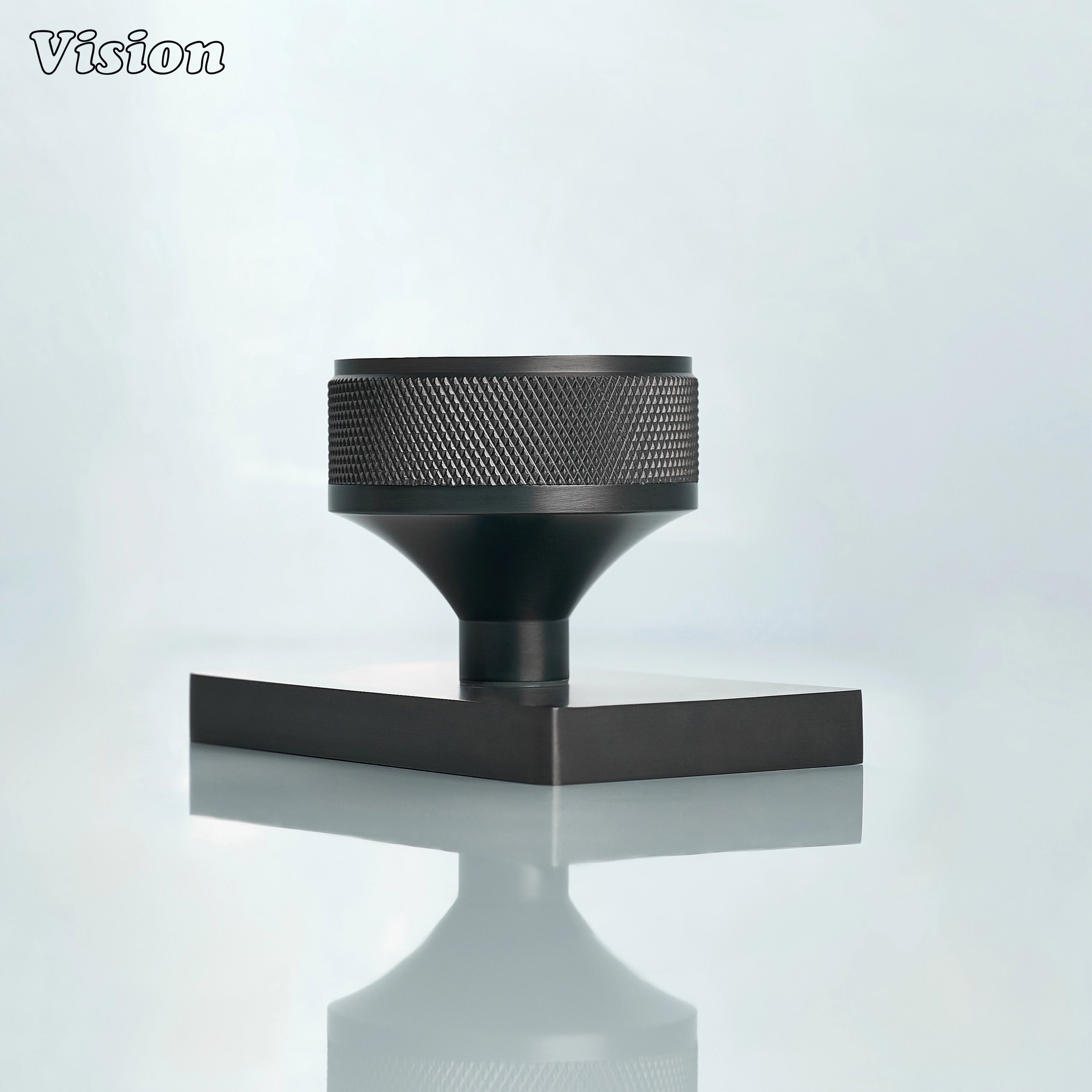 Gunmetal knurled door knob and rectangular plate for modern door hardware